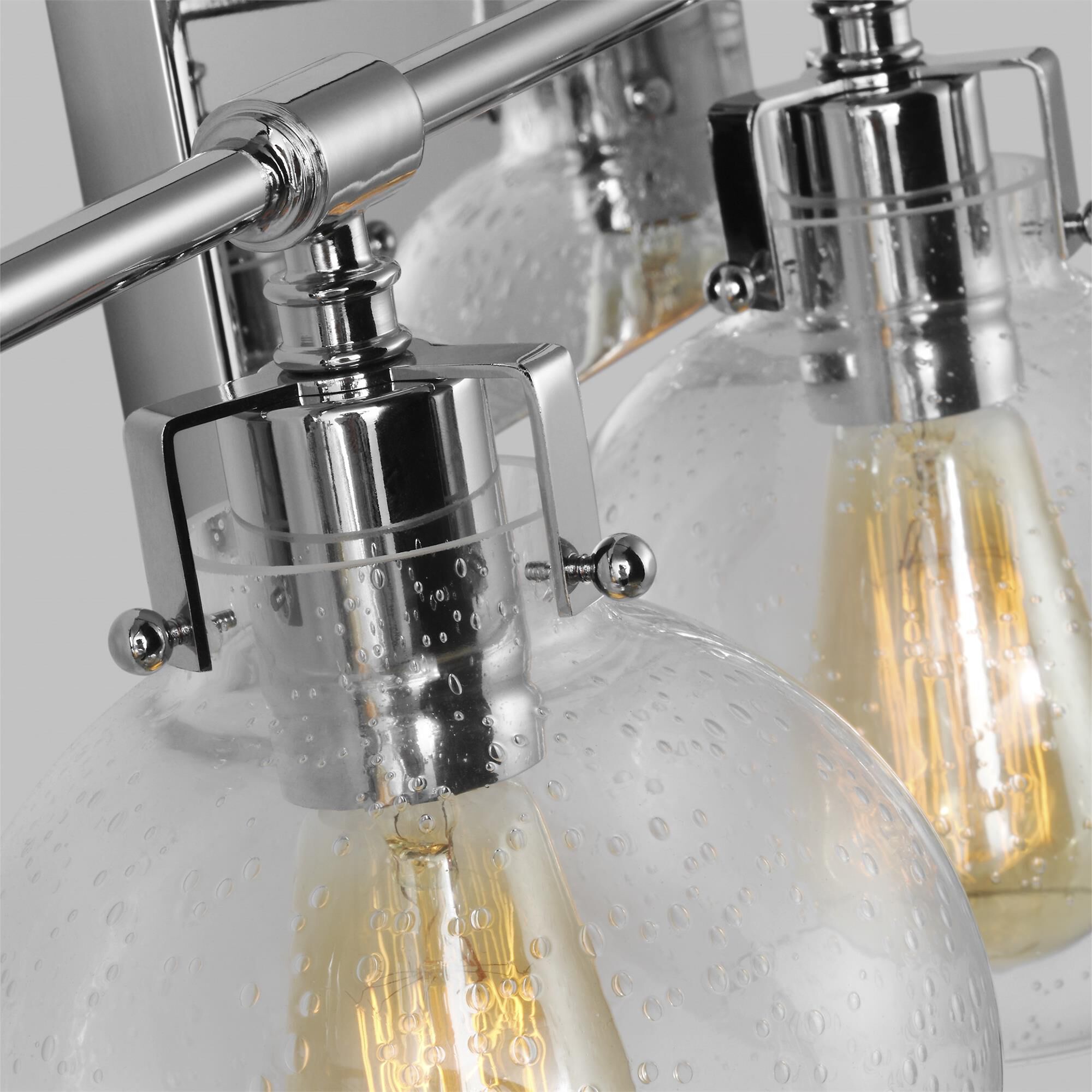 Shown in Chrome finish and Clear Seeded glass