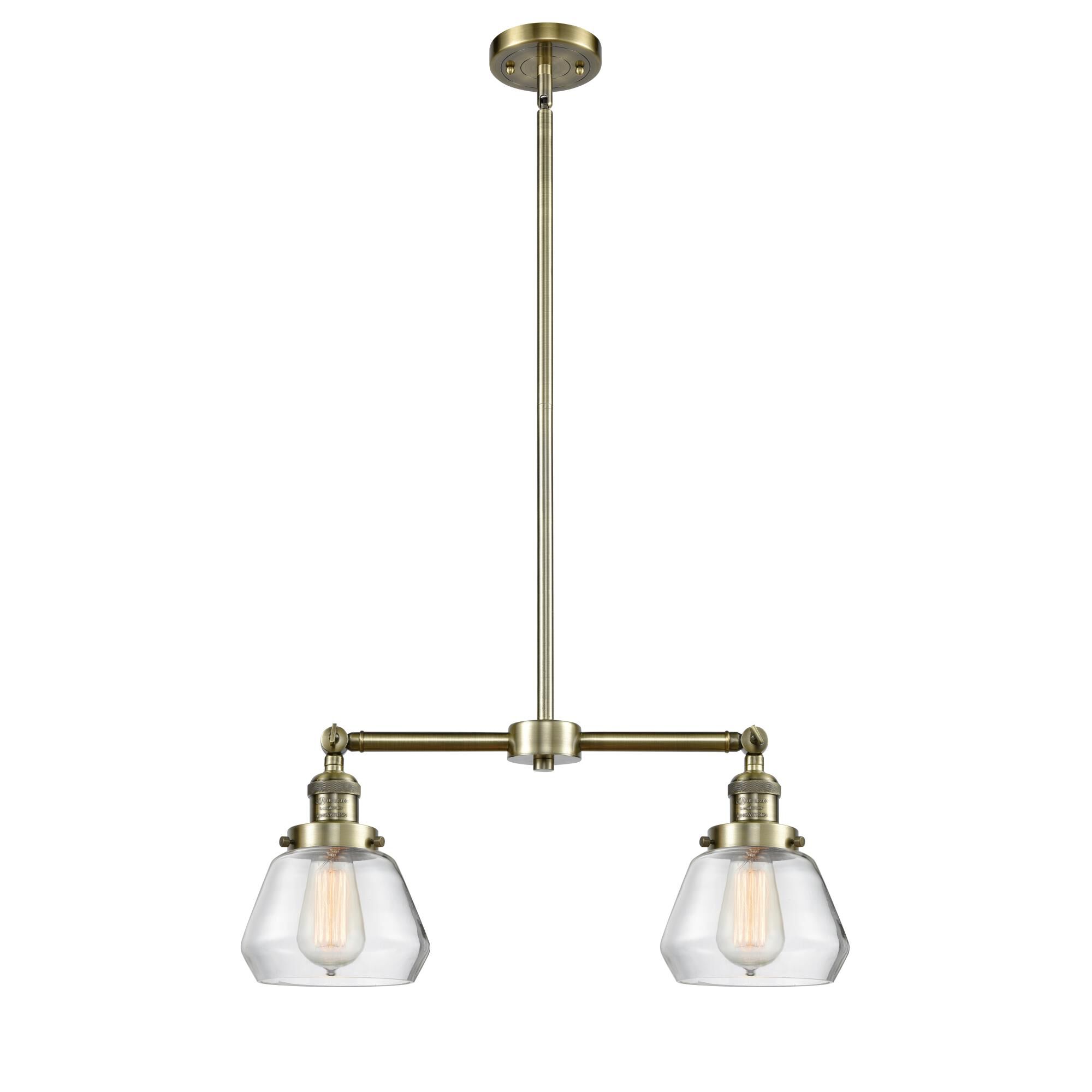 Shown in Antique Brass finish and Clear glass