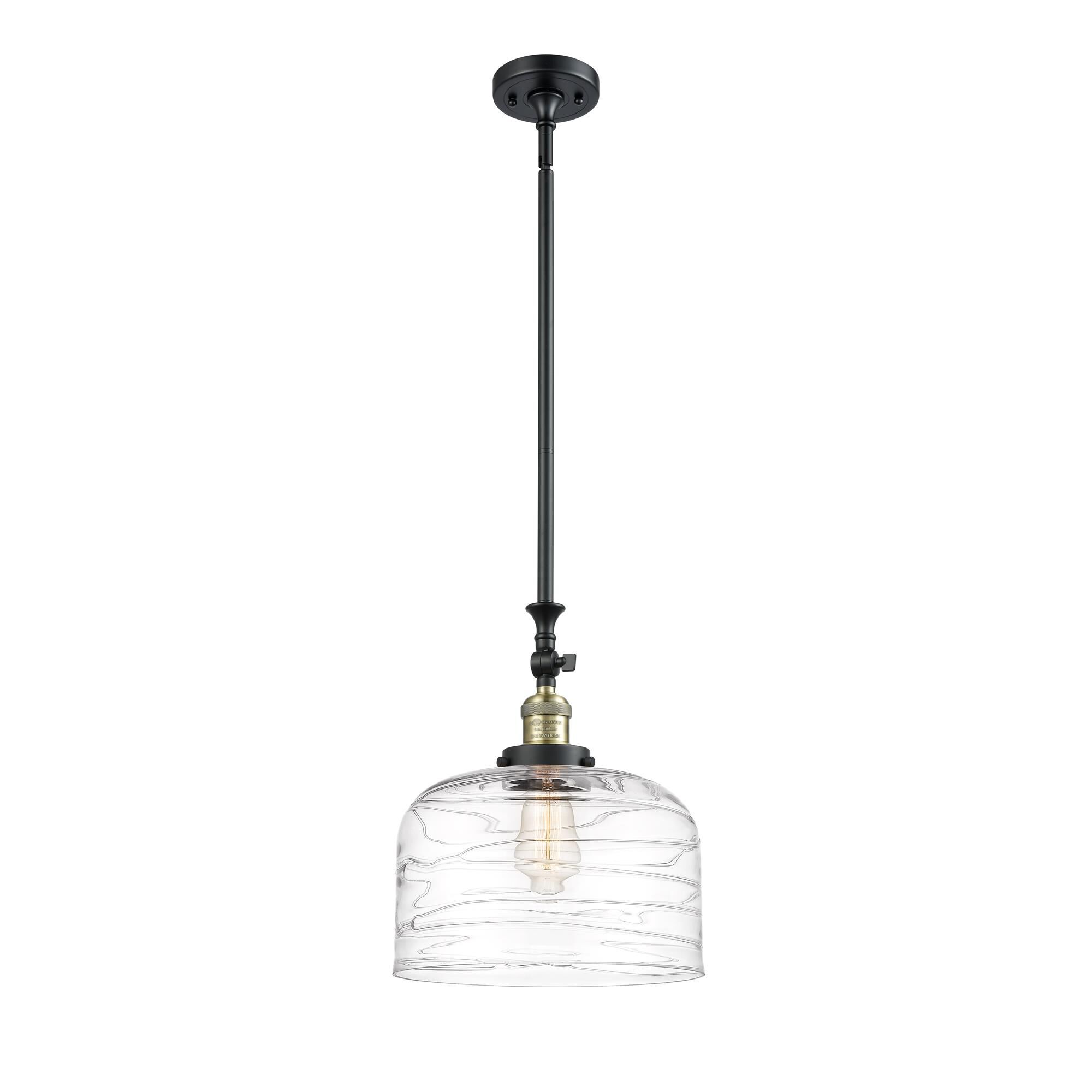 Shown in Black Antique Brass finish and Clear Deco Swirl X-Large Bell glass