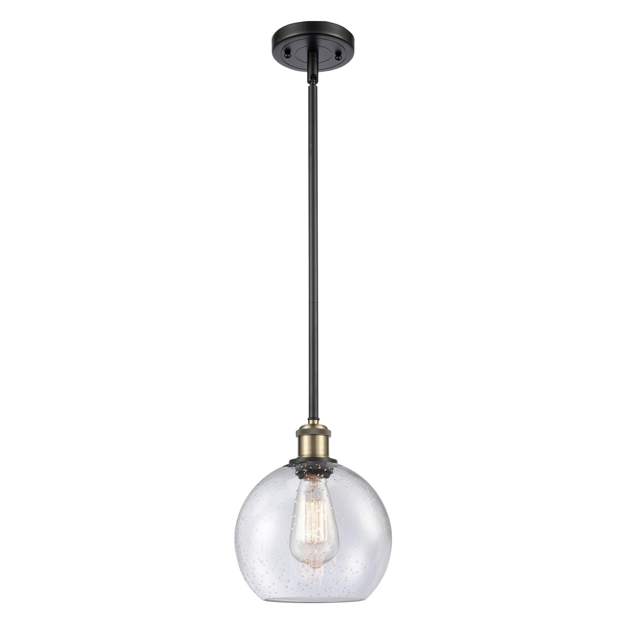 Shown in Black Antique Brass finish and Cased Matte White Seedy glass