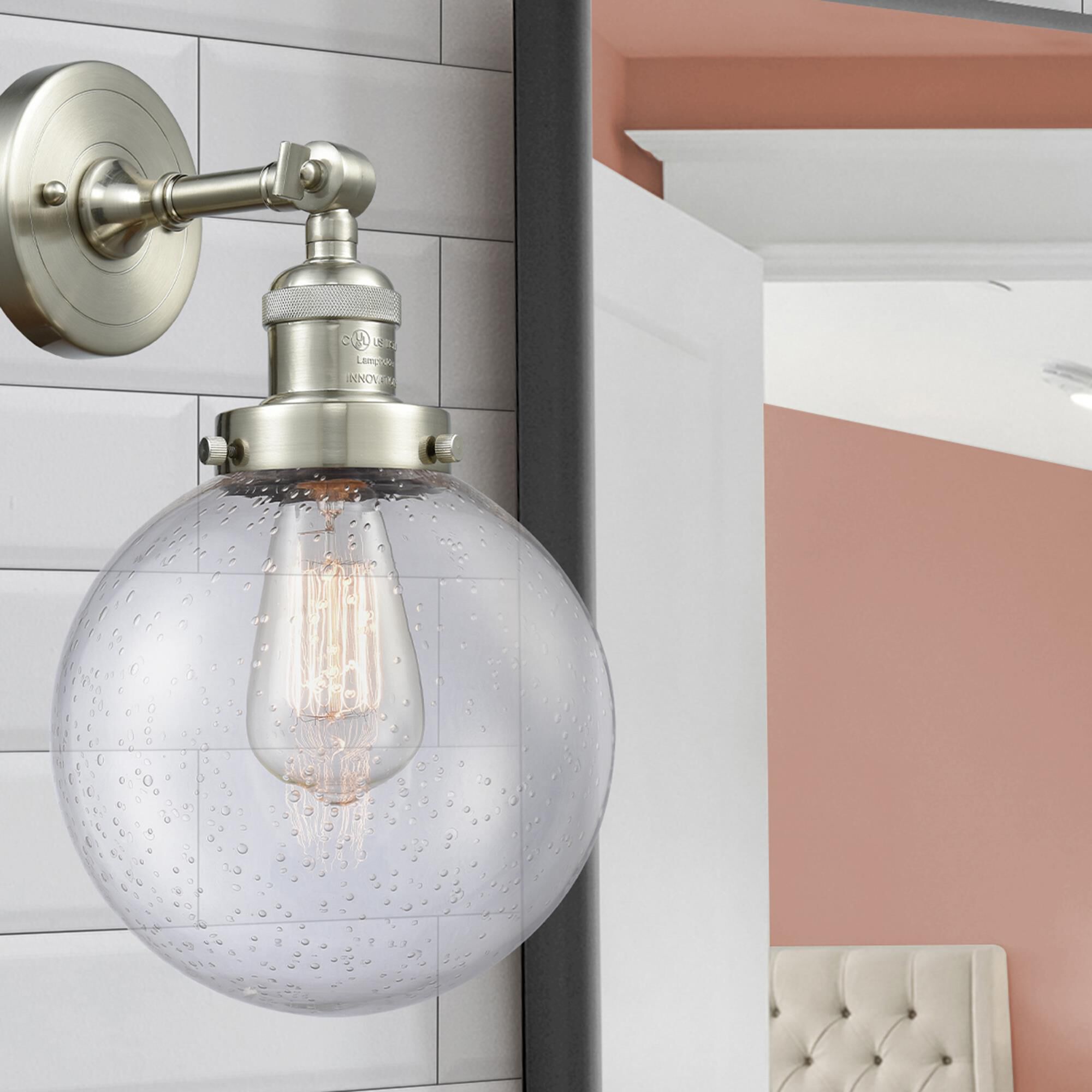 Shown in Brushed Satin Nickel finish and Seedy glass and No Accent accent