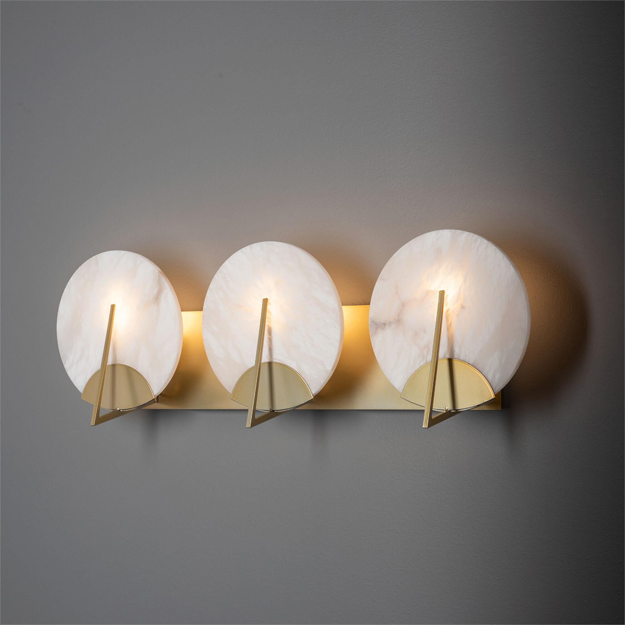 Shown in Modern Brass finish and Alabaster shade