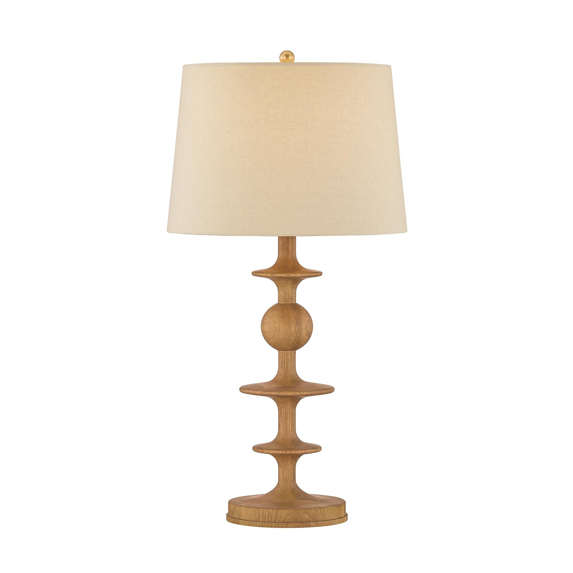 Shown in Aged Brass finish and Wheat Linen shade