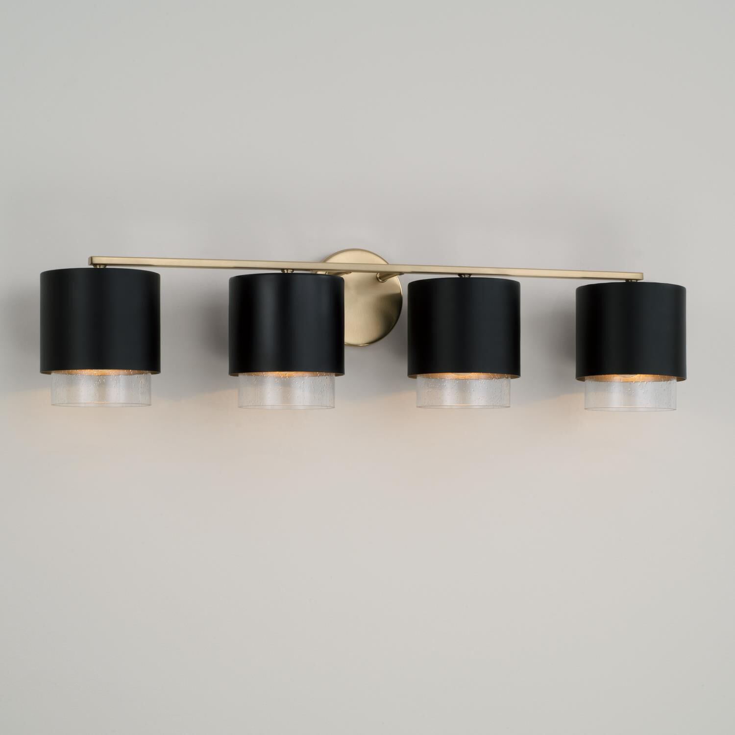 Shown in Matte Brass and Black finish and Clear Seeded glass and Metal with Brass Interior shade