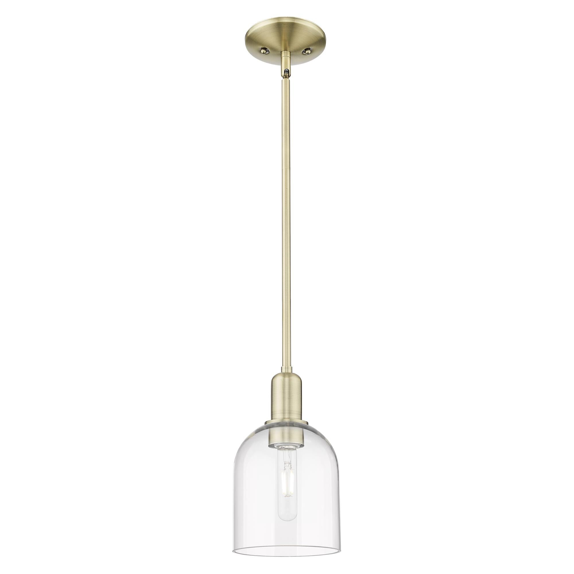 Shown in Antique Brass finish and Clear glass