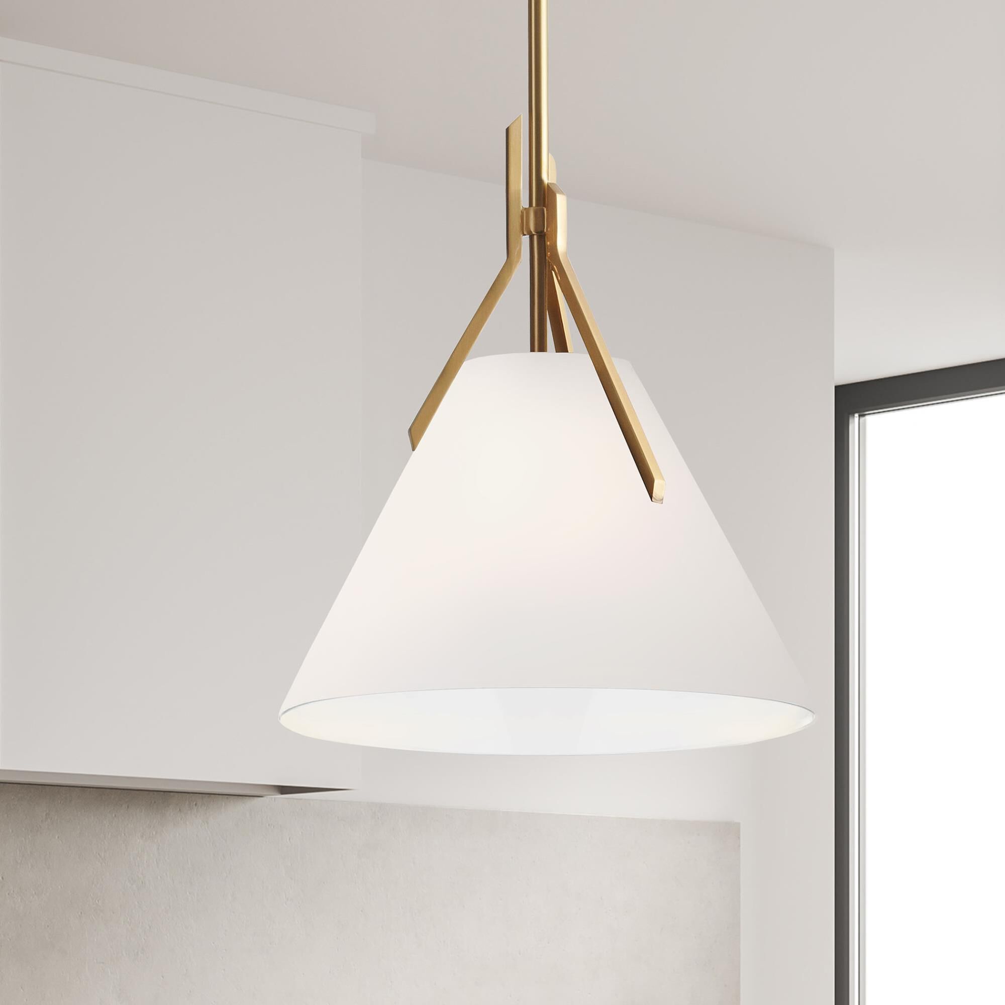 Shown in Aged Brass finish and White Metal Cone shade