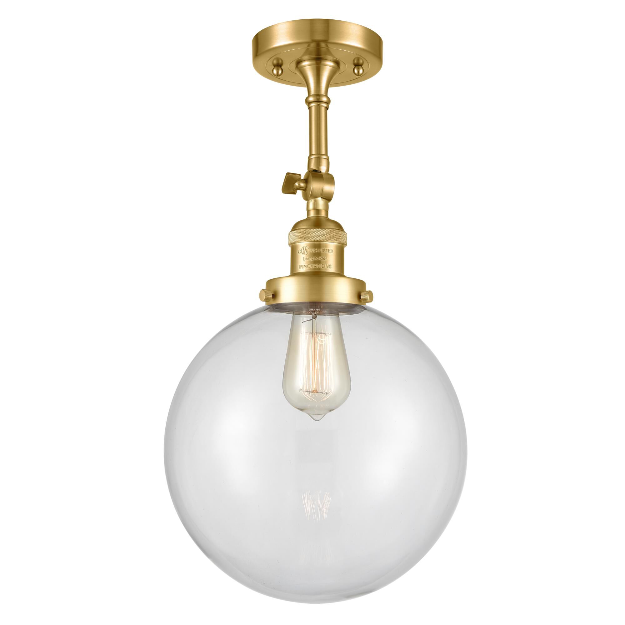 Shown in Satin Gold finish and Clear Beacon glass