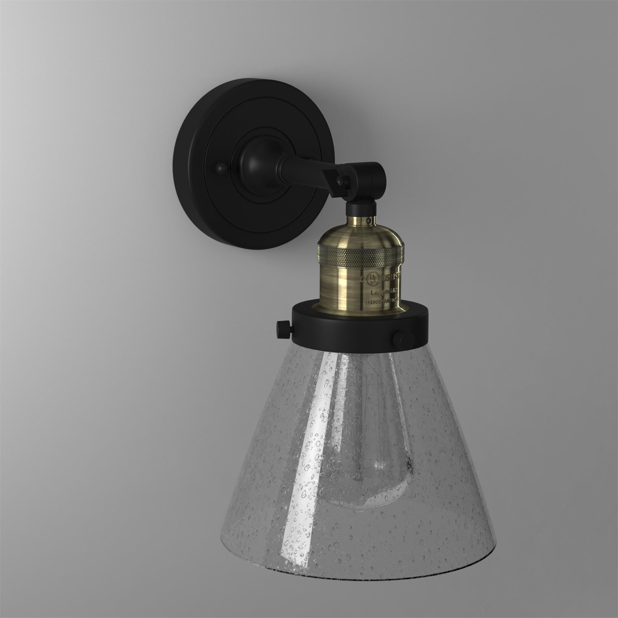 Shown in Black Antique Brass finish and Seedy glass