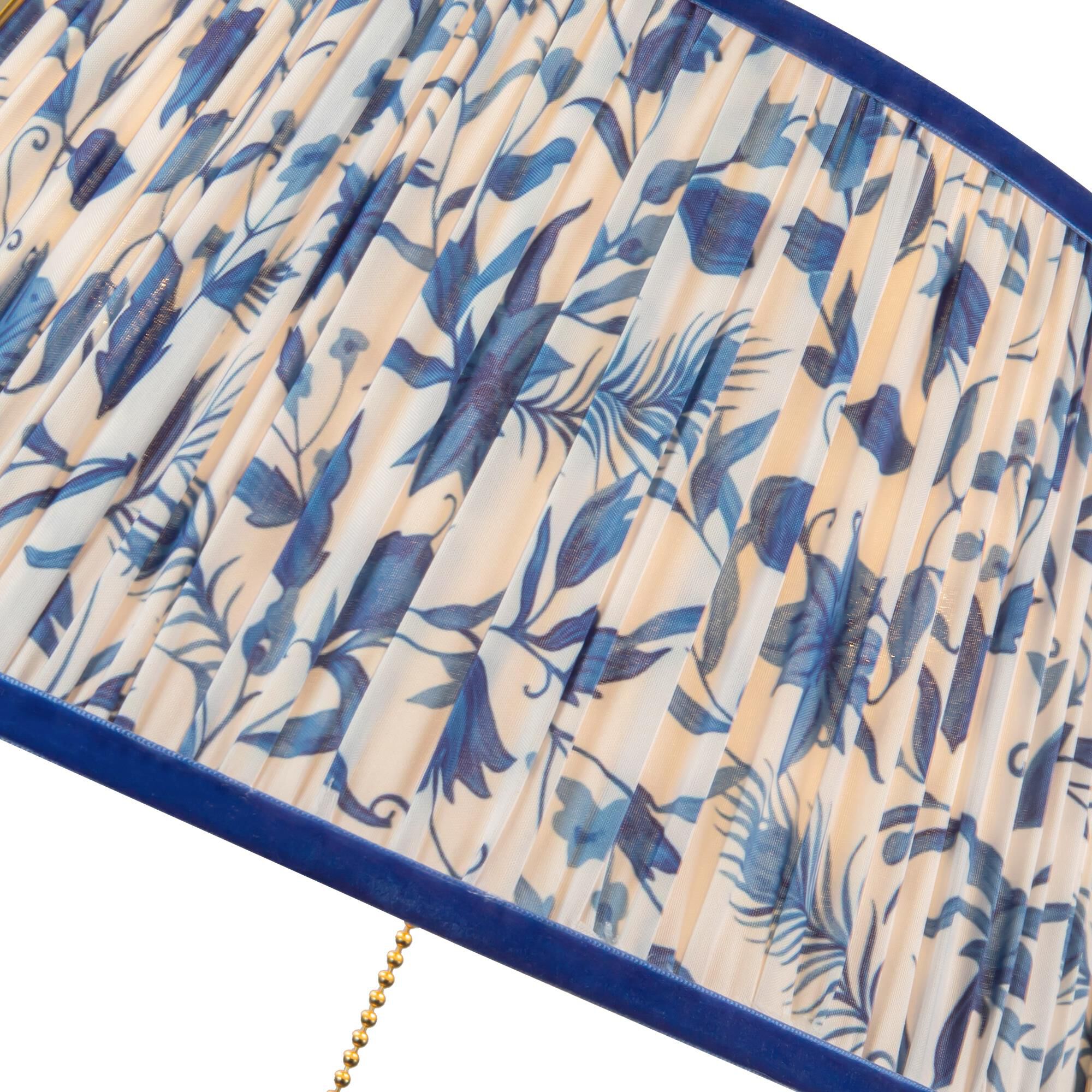 Shown in Brushed Gold finish and Blue Linen shade