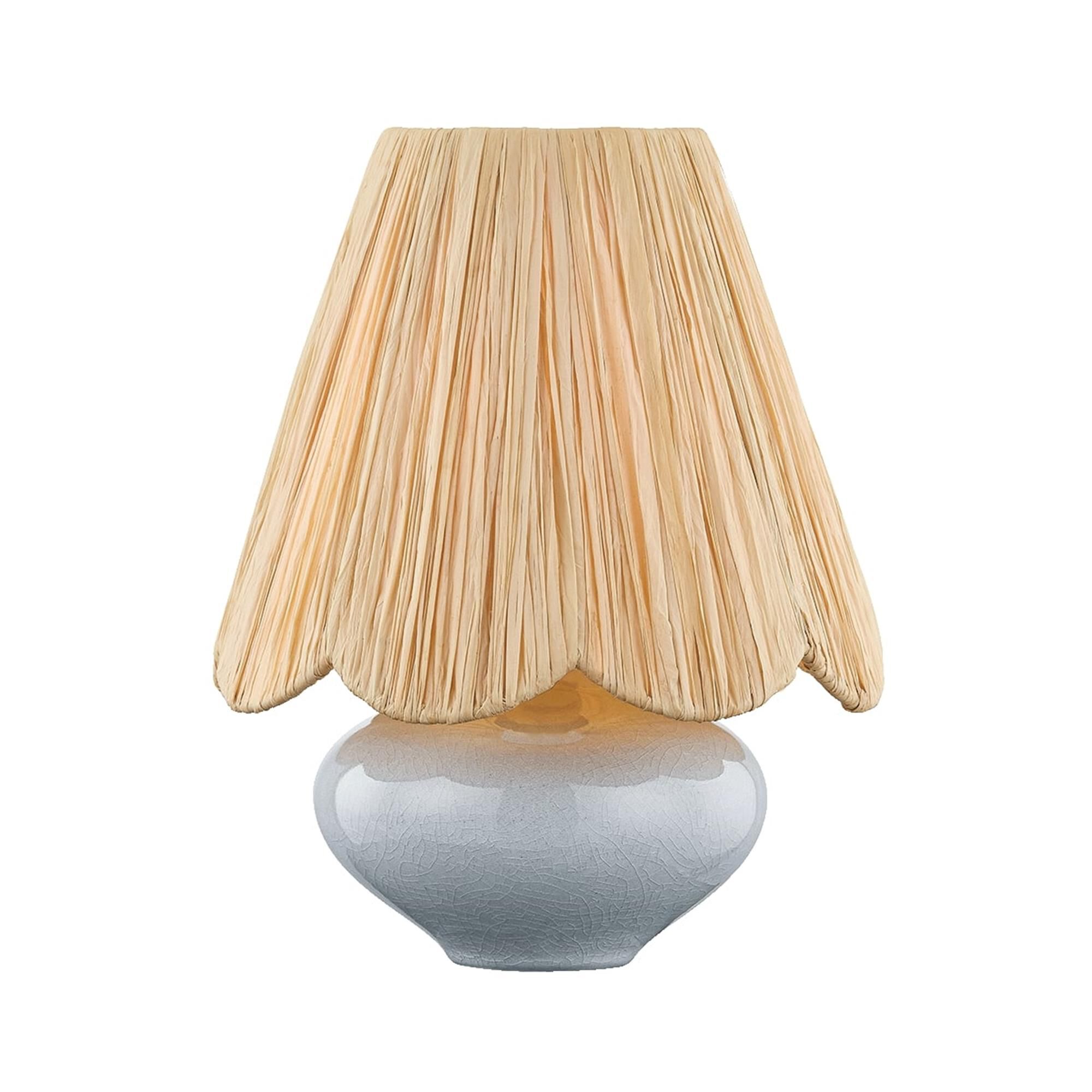 Shown in Aged Brass and Ceramic Frost Crackle finish and Natural Raffia shade