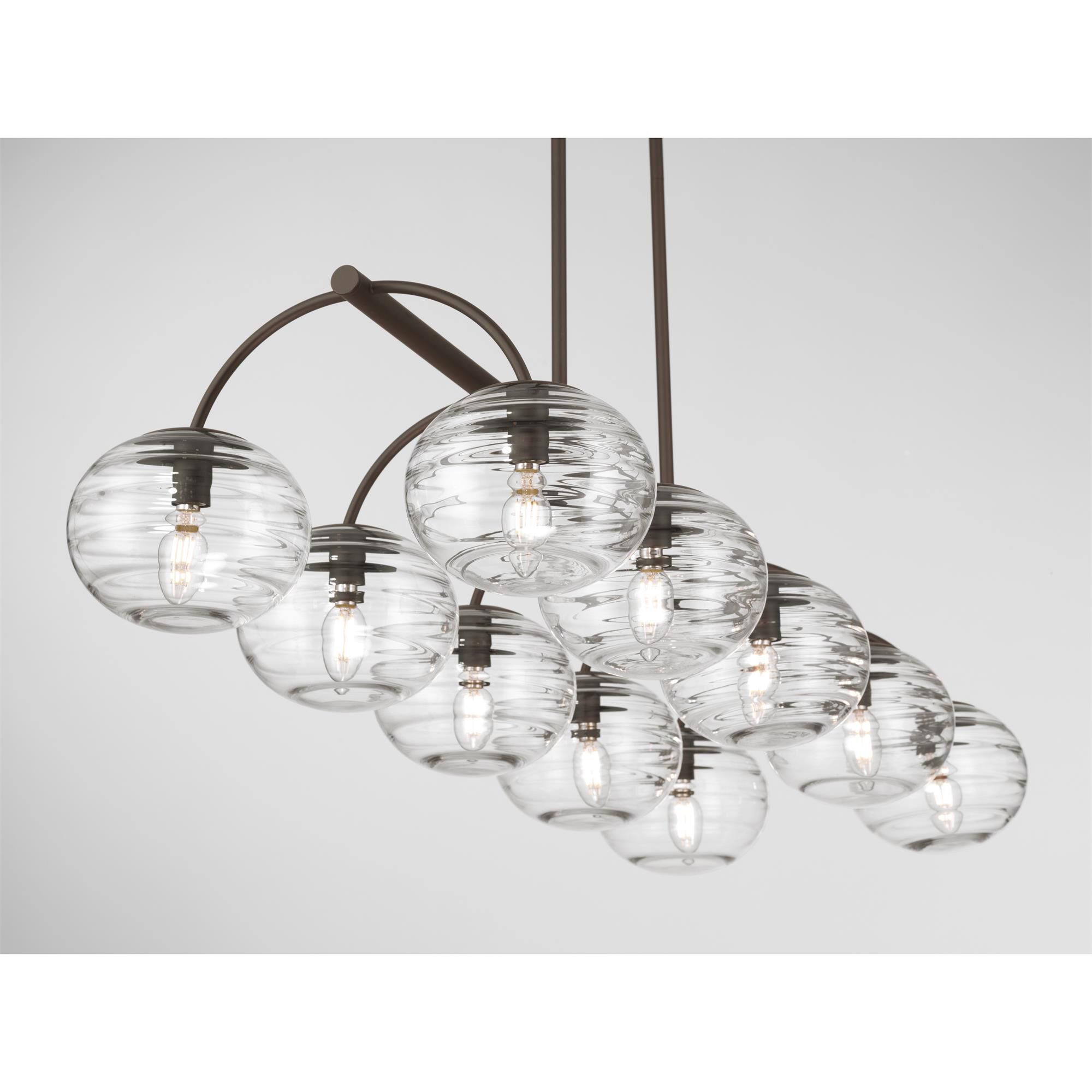 Shown in Dark Bronze finish and Clear Ribbed glass