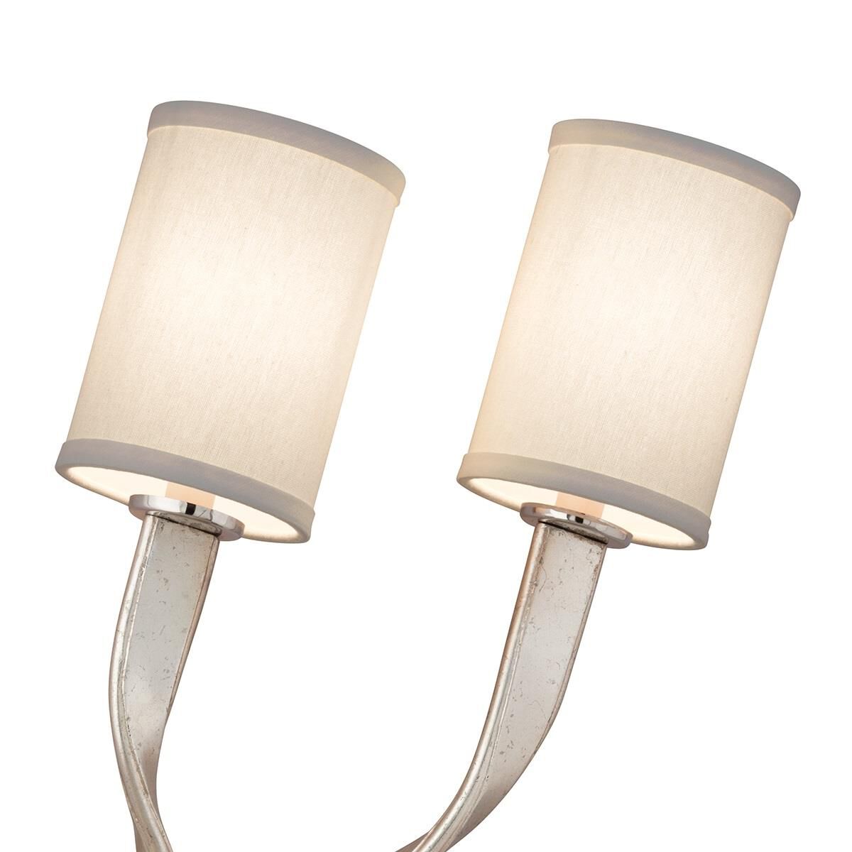 Shown in Modern Silver Leaf With Polished Stainless Accents finish and Cream glass and Hardback Linen shade
