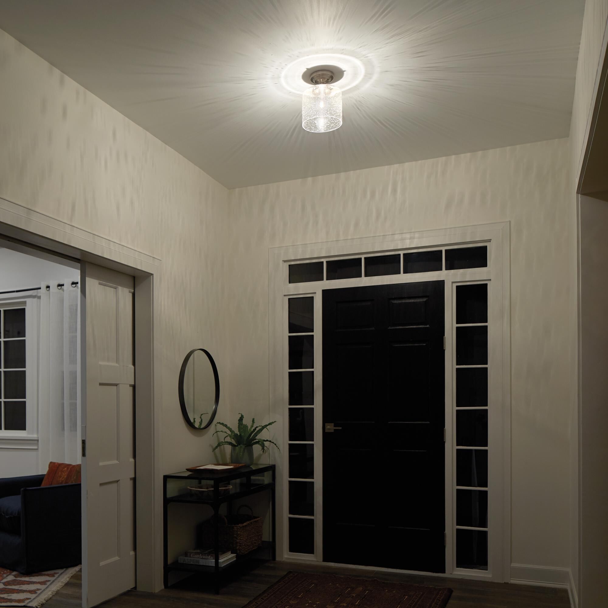 Shown in Brushed Nickel finish and Clear Seeded glass