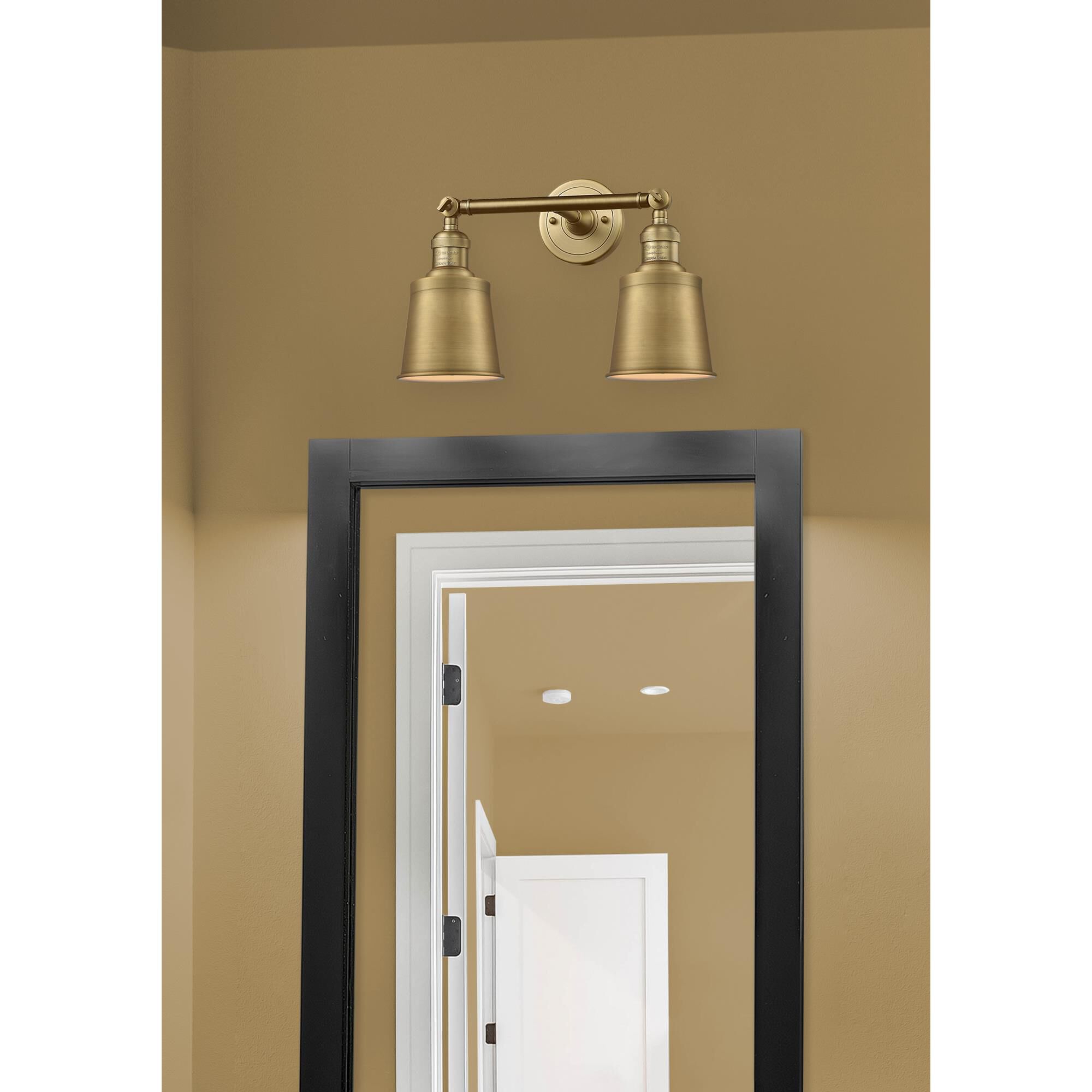 Shown in Brushed Brass finish and Brushed Brass shade