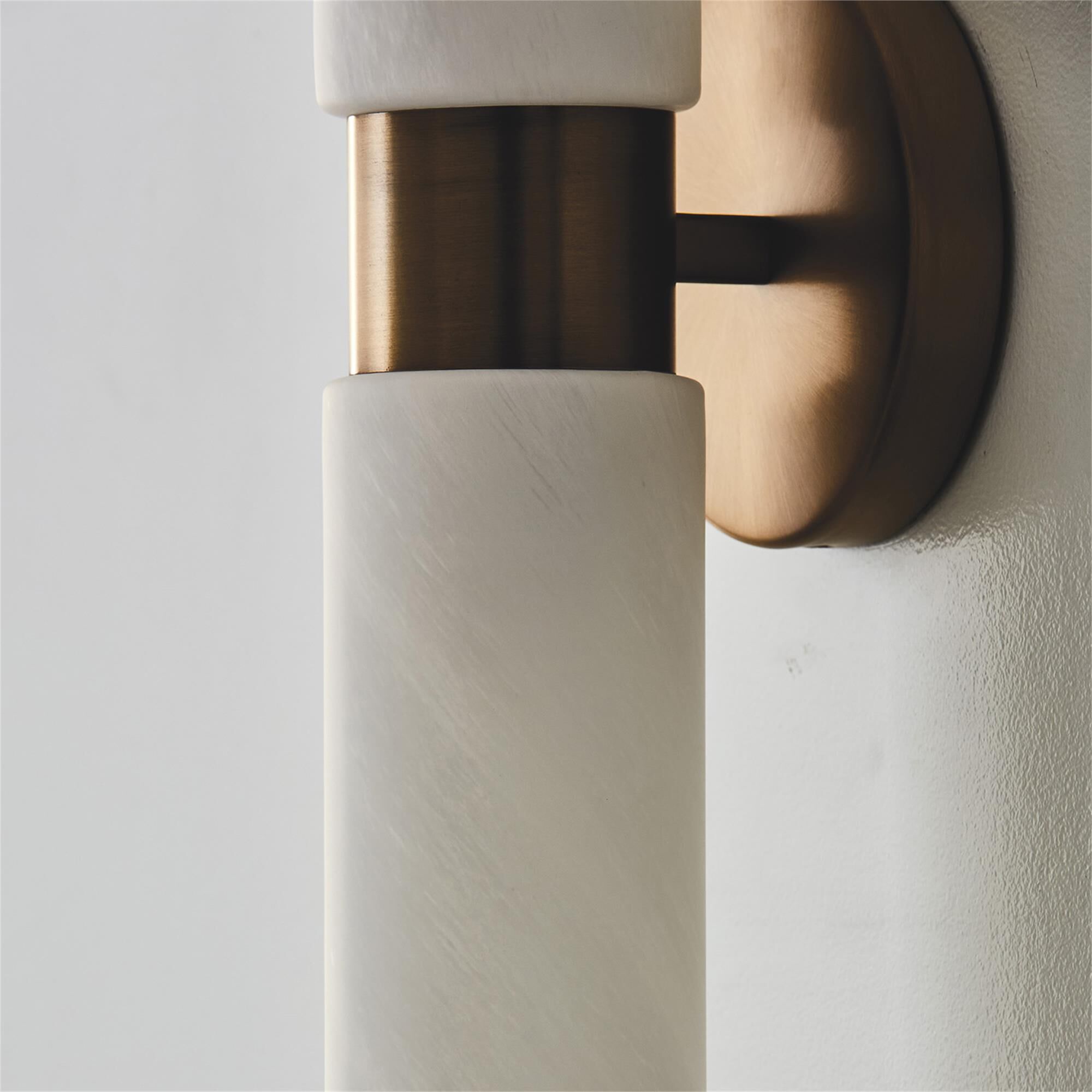 Shown in Aged Brass finish and Faux Alabaster glass