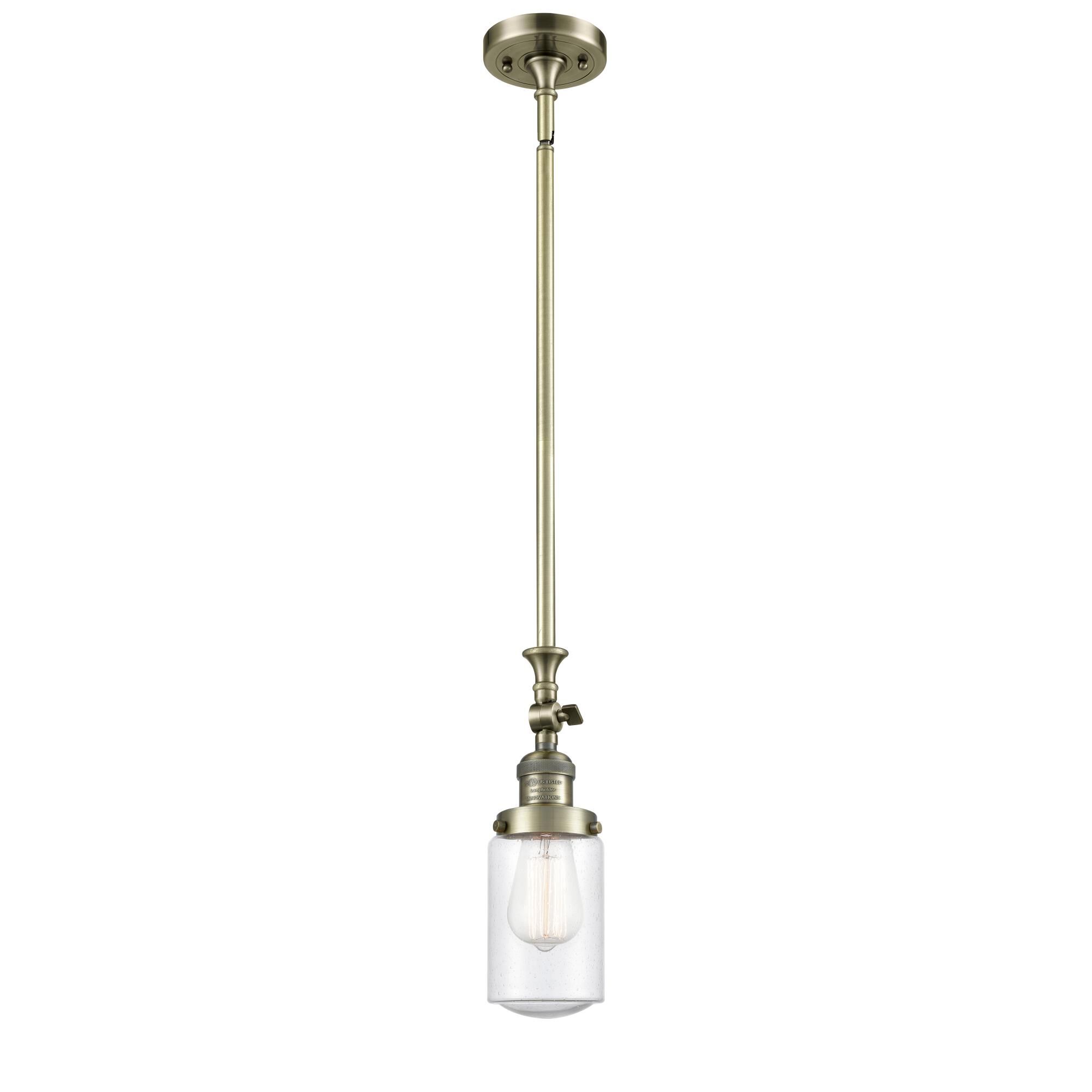 Shown in Antique Brass finish and Schoolhouse glass and Glass shade