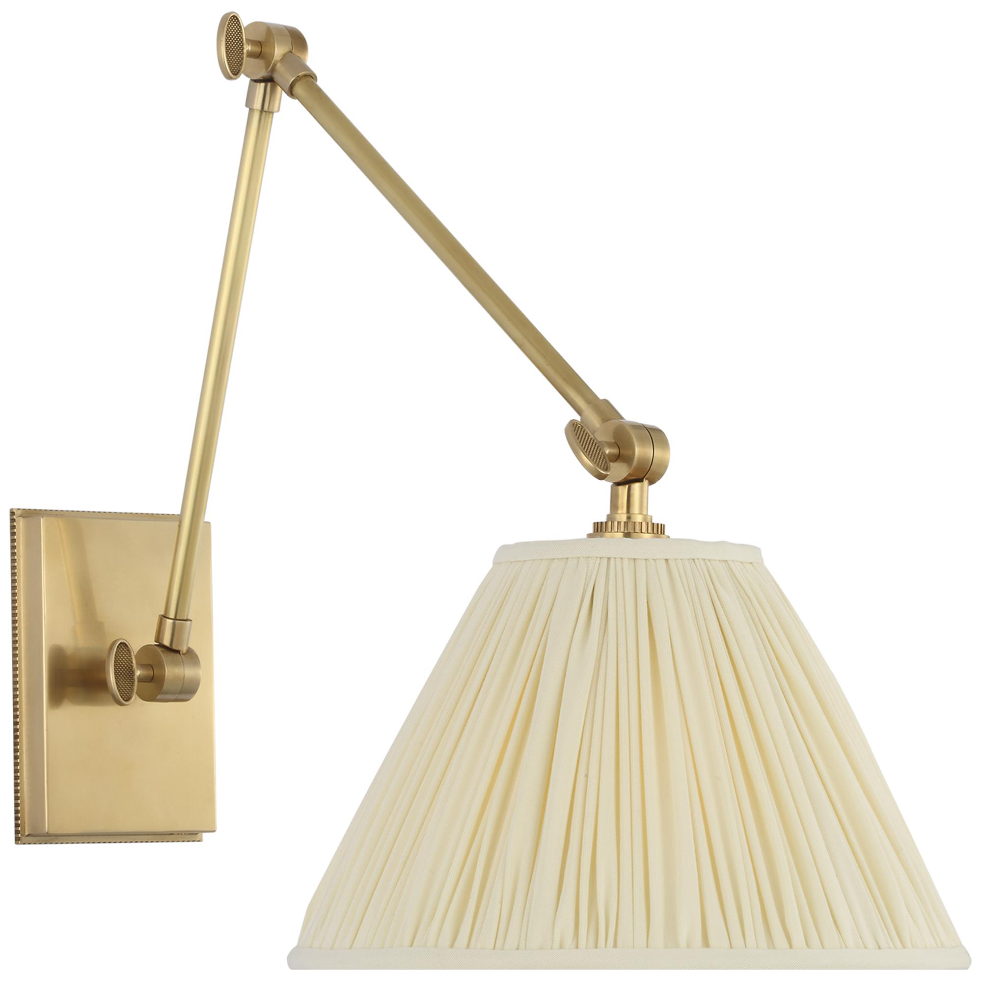 Shown in Soft Brass finish and Silk Pleated shade