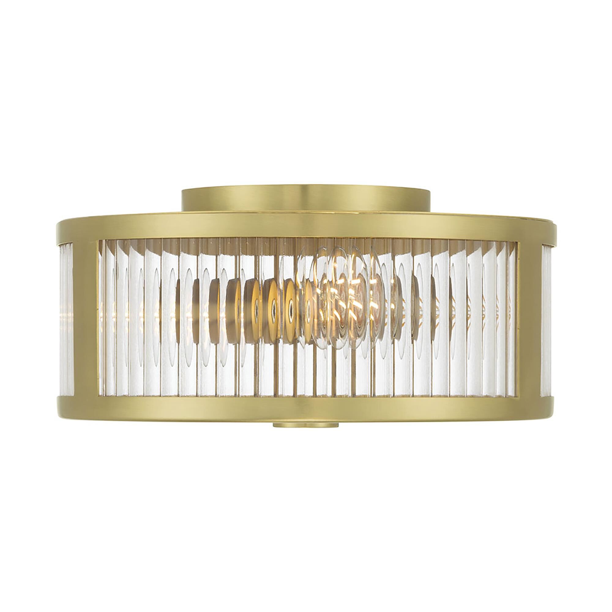 Shown in Vintage Brass finish and Clear Ribbed glass