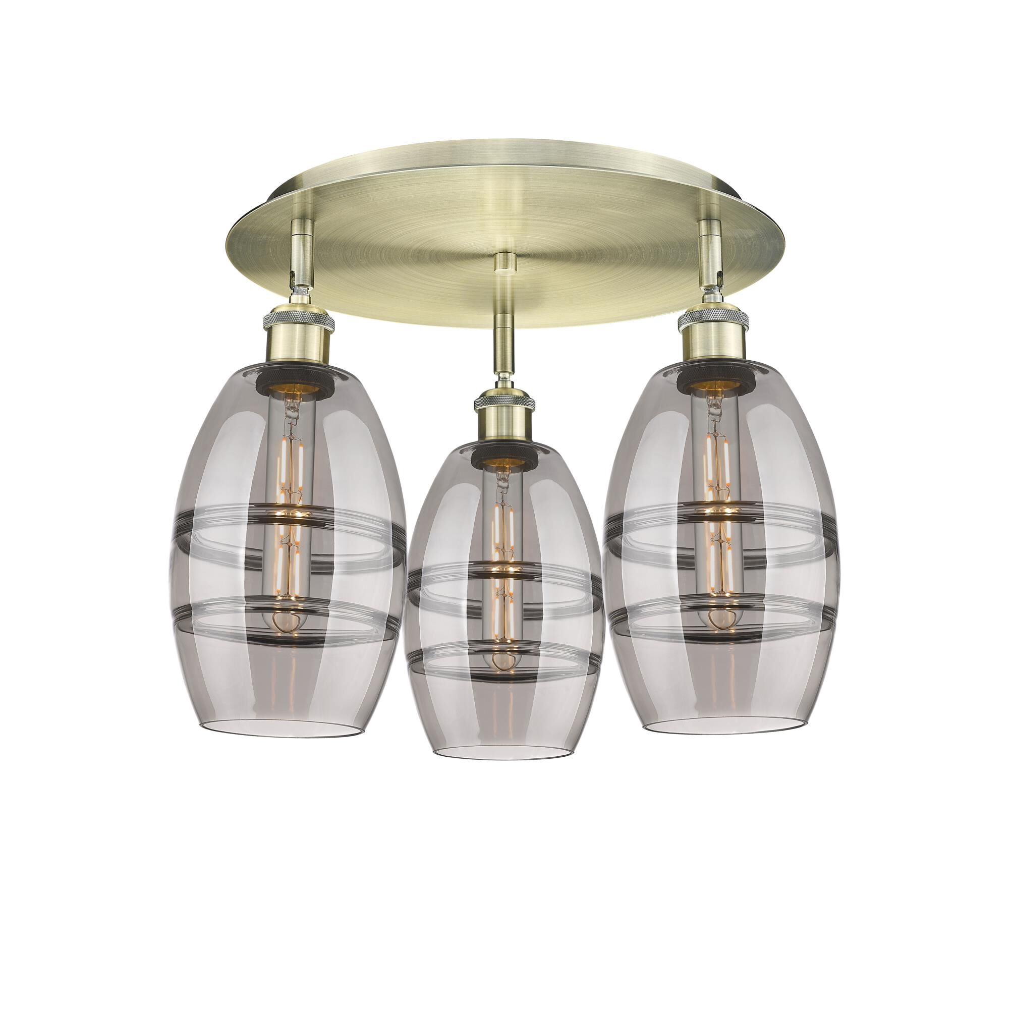 Shown in Antique Brass finish and Light Smoke glass