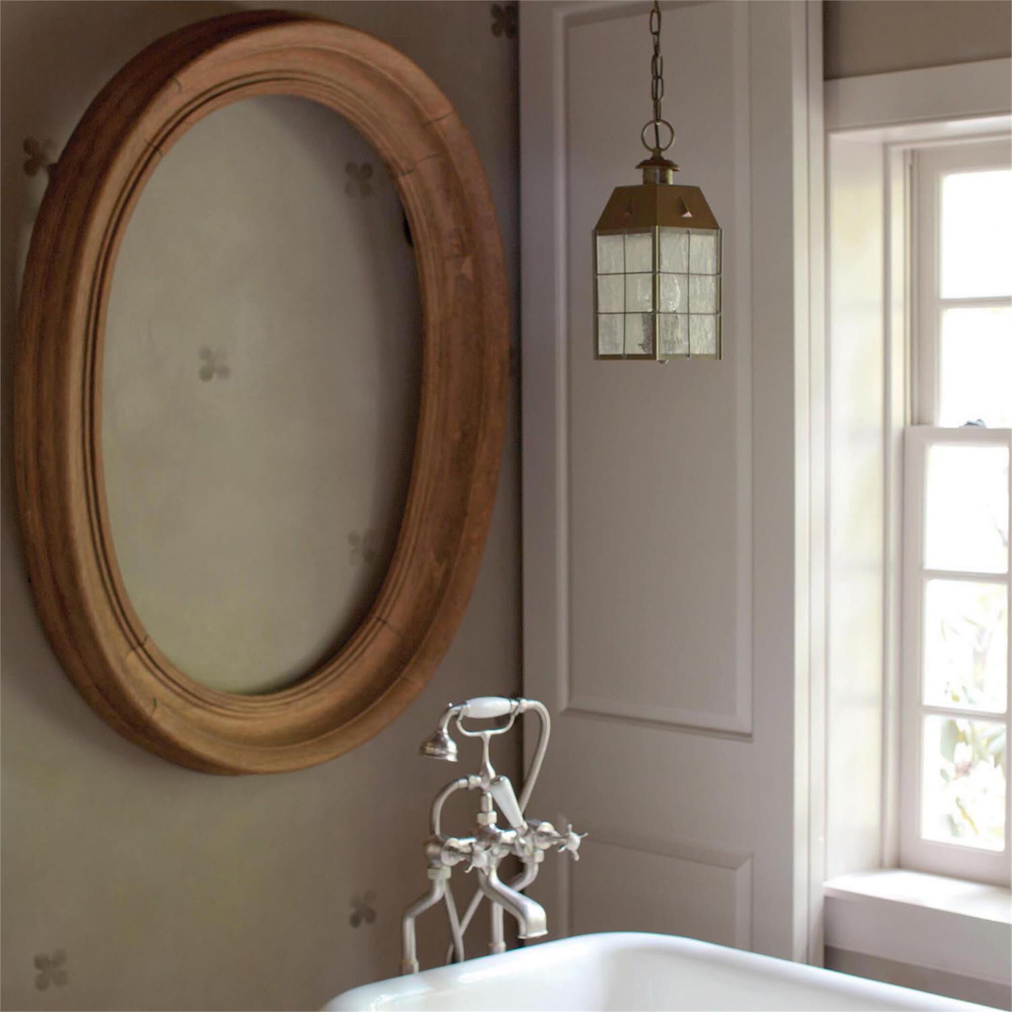 Shown in Aged Brass finish and Clear Seedy Panels glass