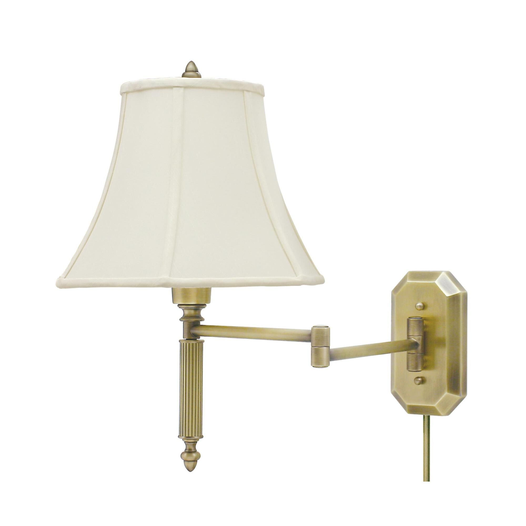 Shown in Antique Brass finish and Off-White Linen Softback shade