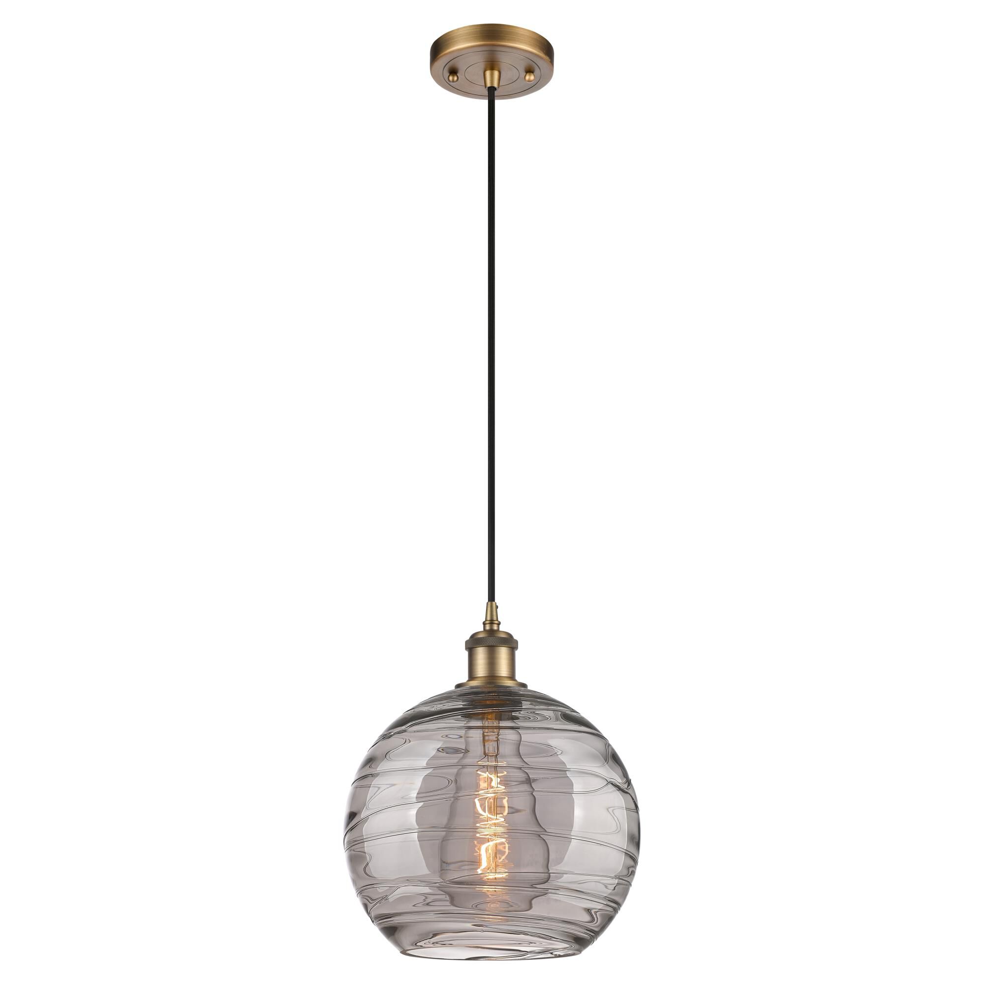 Shown in Brushed Brass finish and Light Smoke Deco Swirl glass