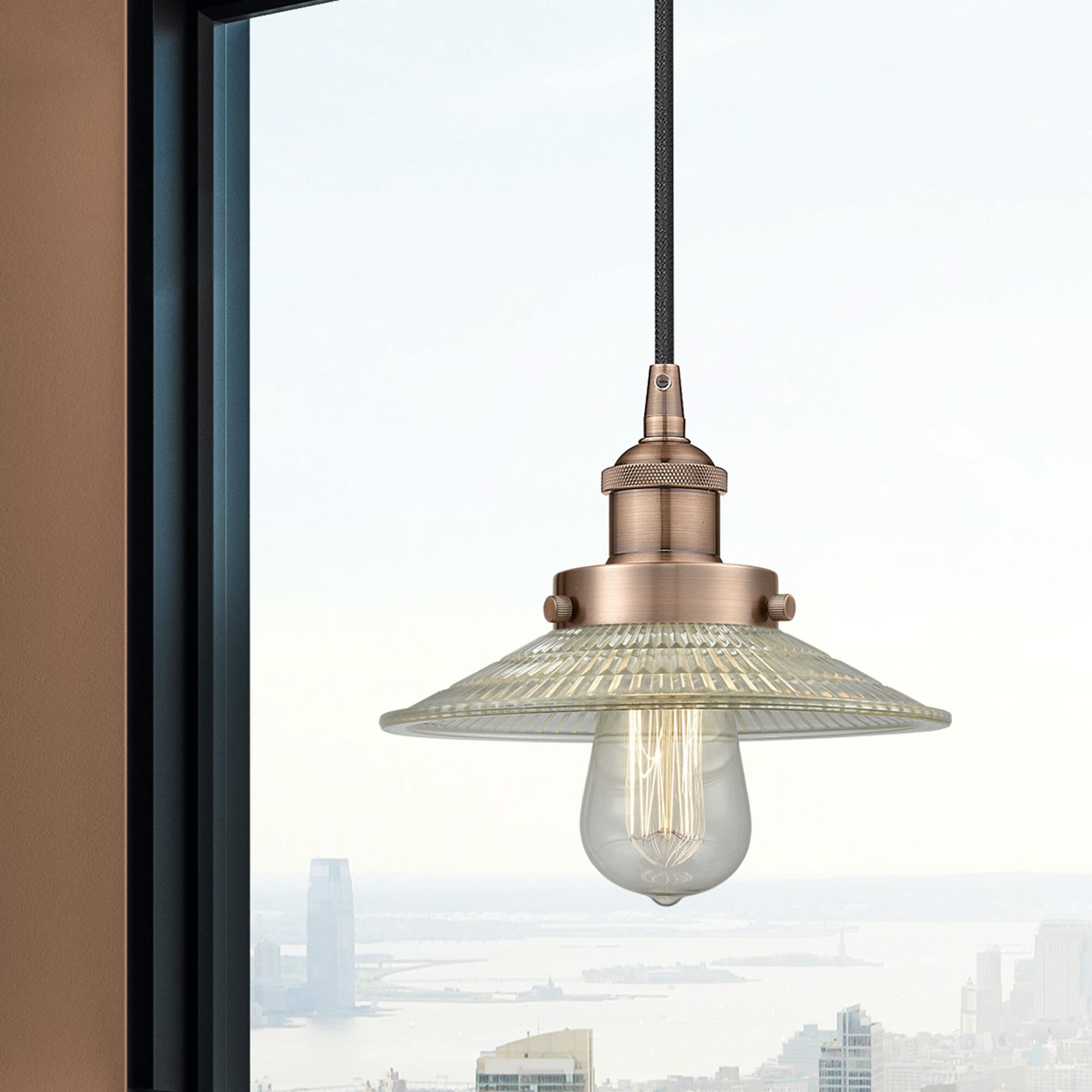 Shown in Antique Copper finish and Clear glass