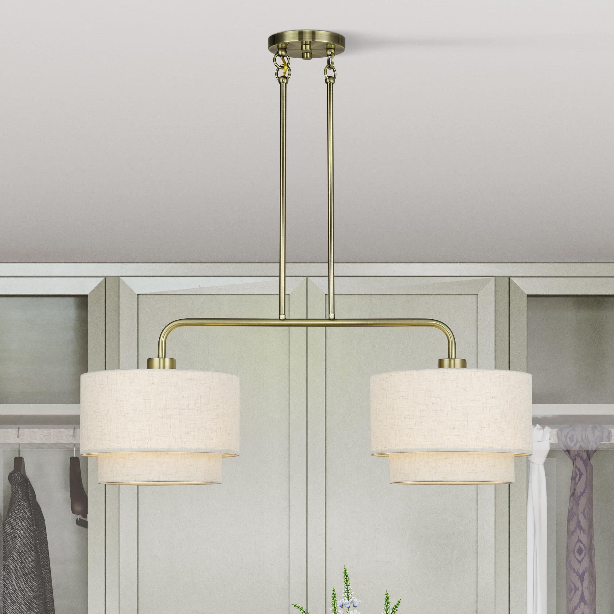 Shown in Antique Brass finish and Hand Crafted Oatmeal Color Fabric with White Color Inside shade