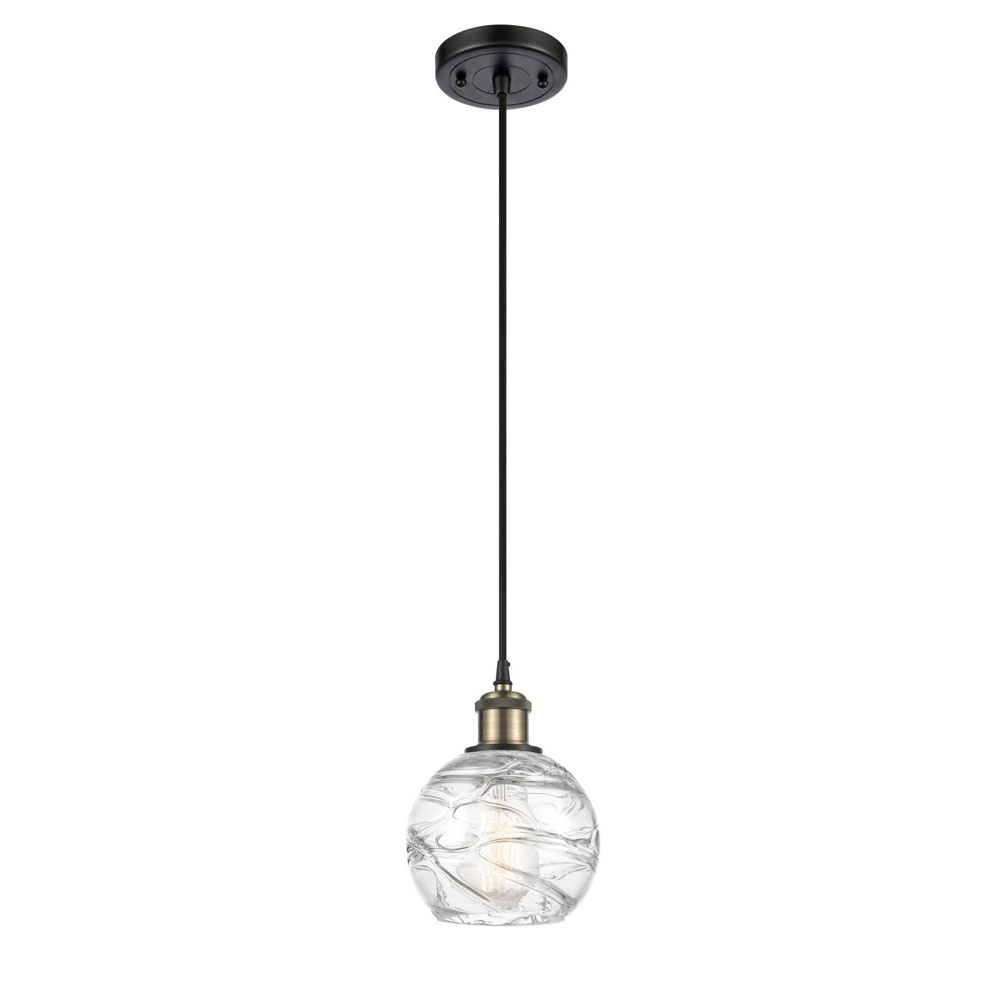 Shown in Black Antique Brass finish and Clear Deco Swirl glass