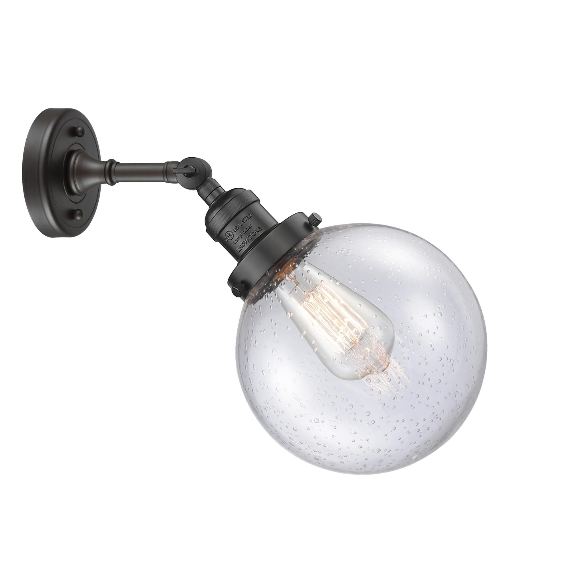 Shown in Oil Rubbed Bronze finish and Seedy glass and No Accent accent