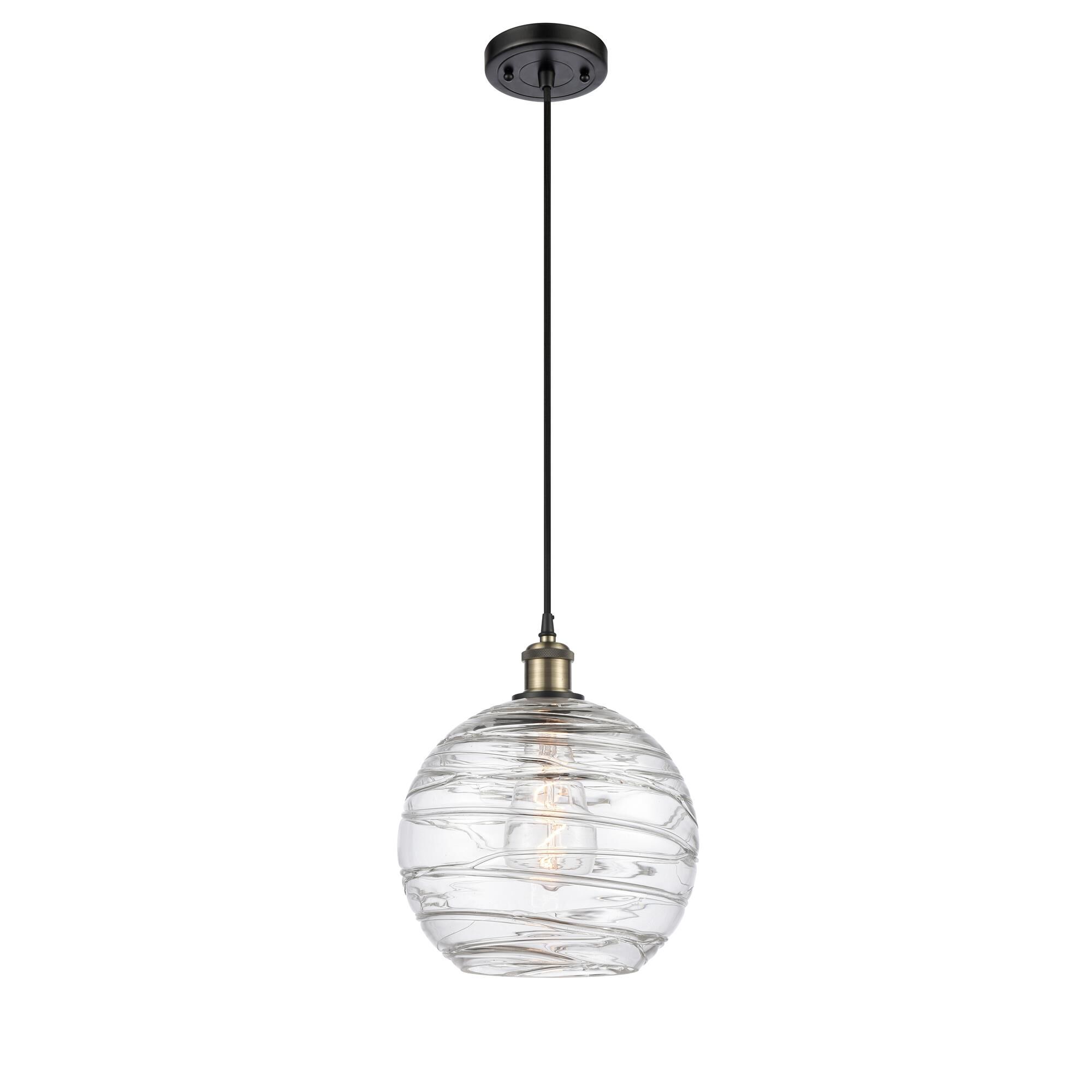 Shown in Black Antique Brass finish and Clear Large Deco Swirl glass
