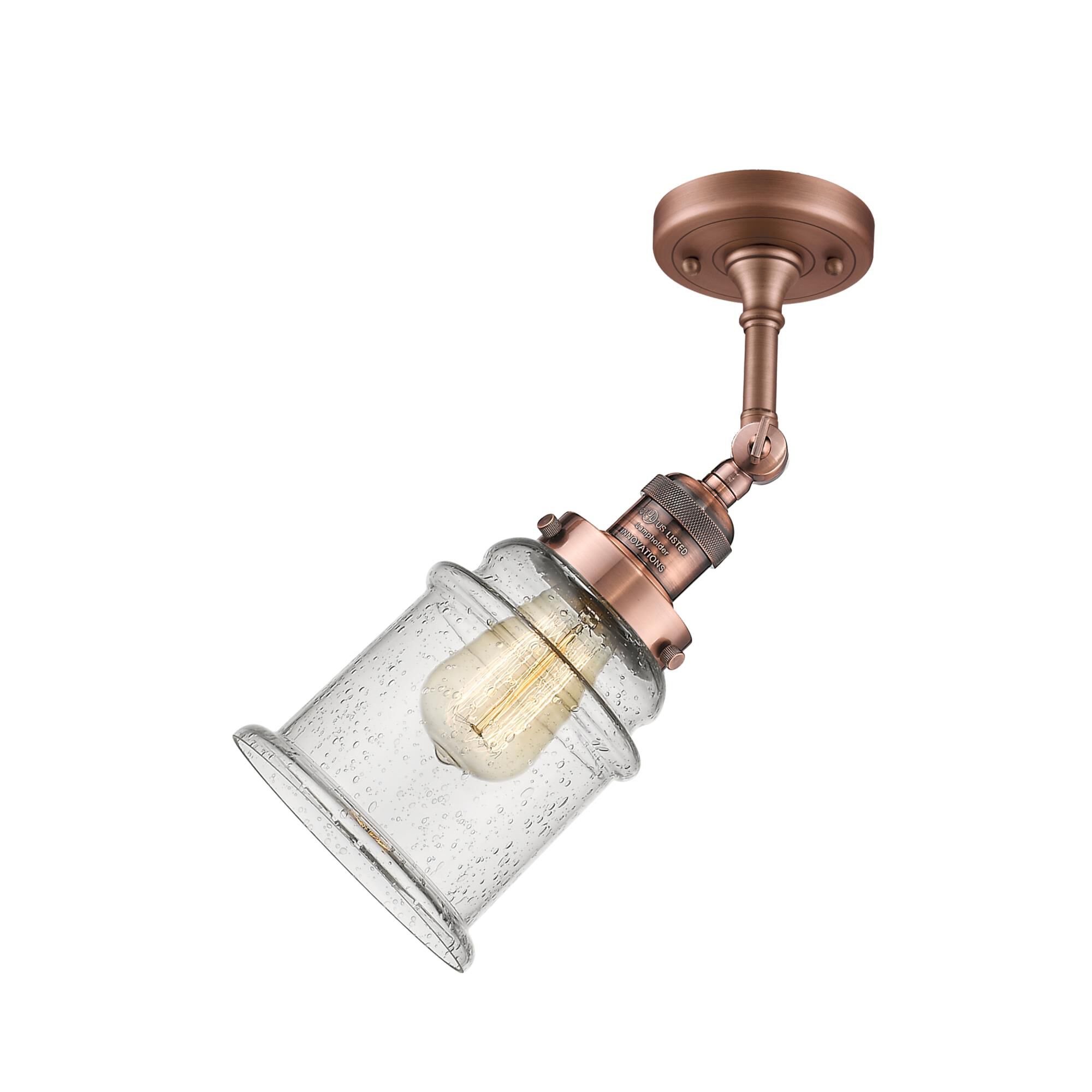 Shown in Antique Copper finish and Seedy glass and None accent