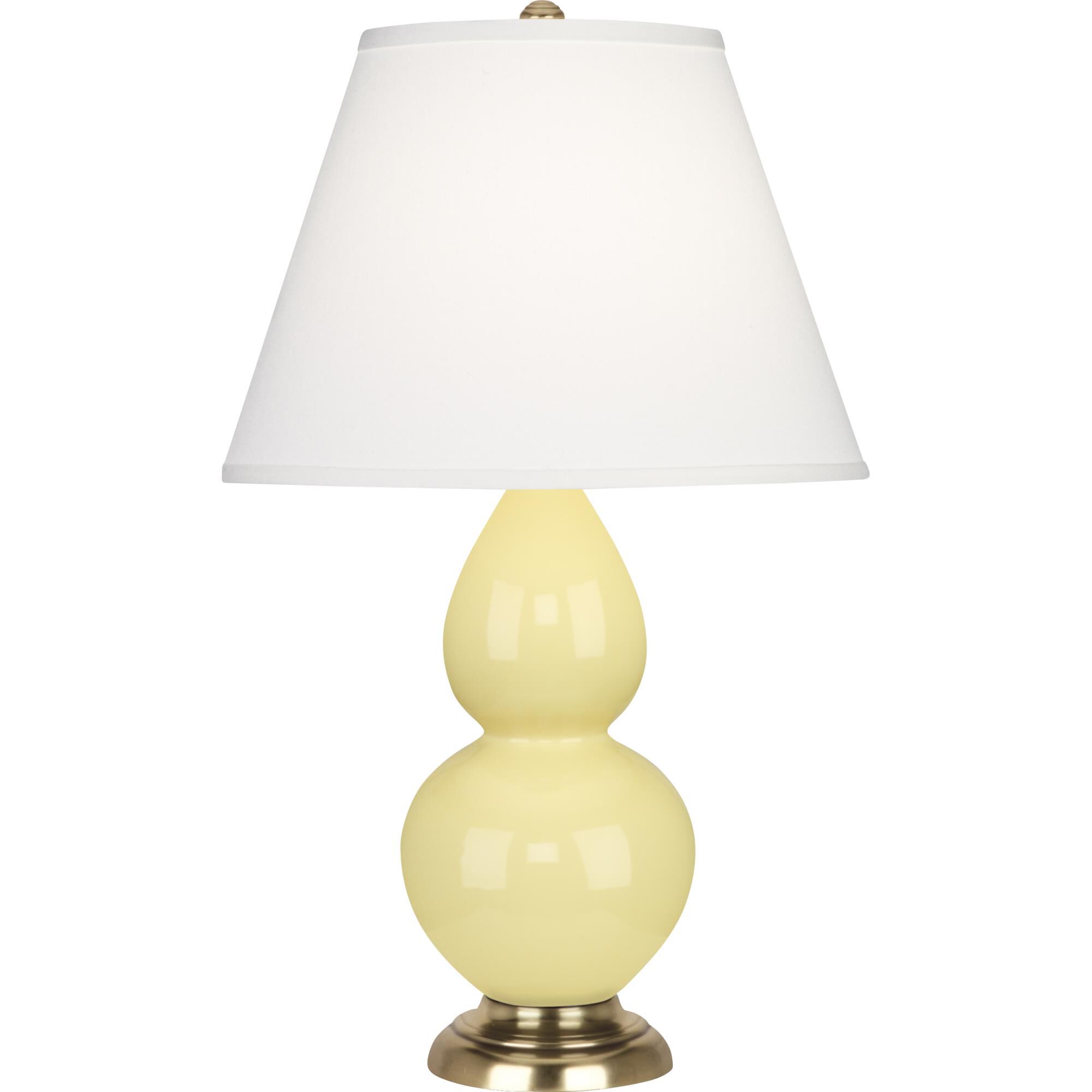 Shown in Butter Glazed Ceramic With Antique Natural Brass ed Accents finish and Pearl Dupioni Fabric shade