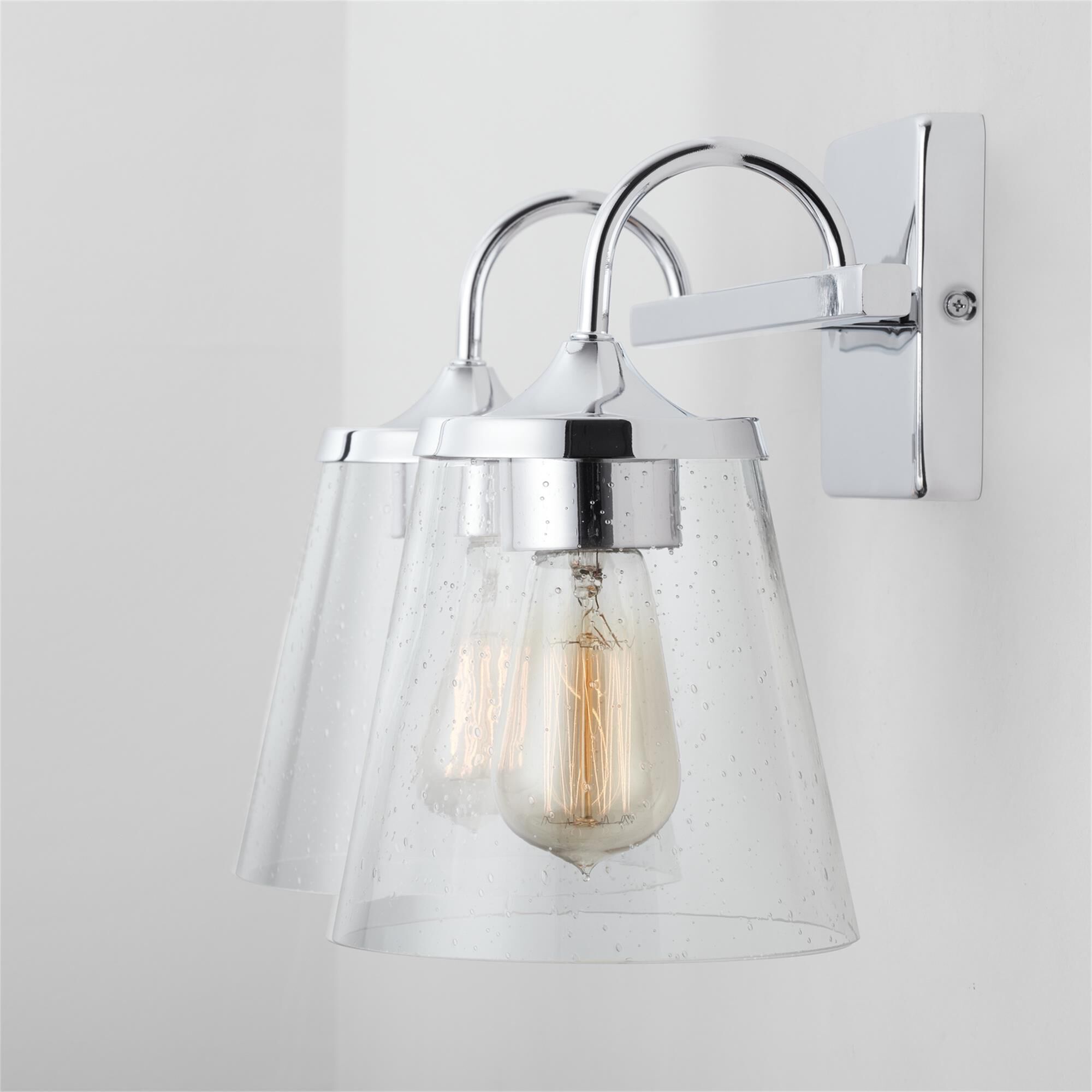 Shown in Chrome finish and Clear Seeded glass