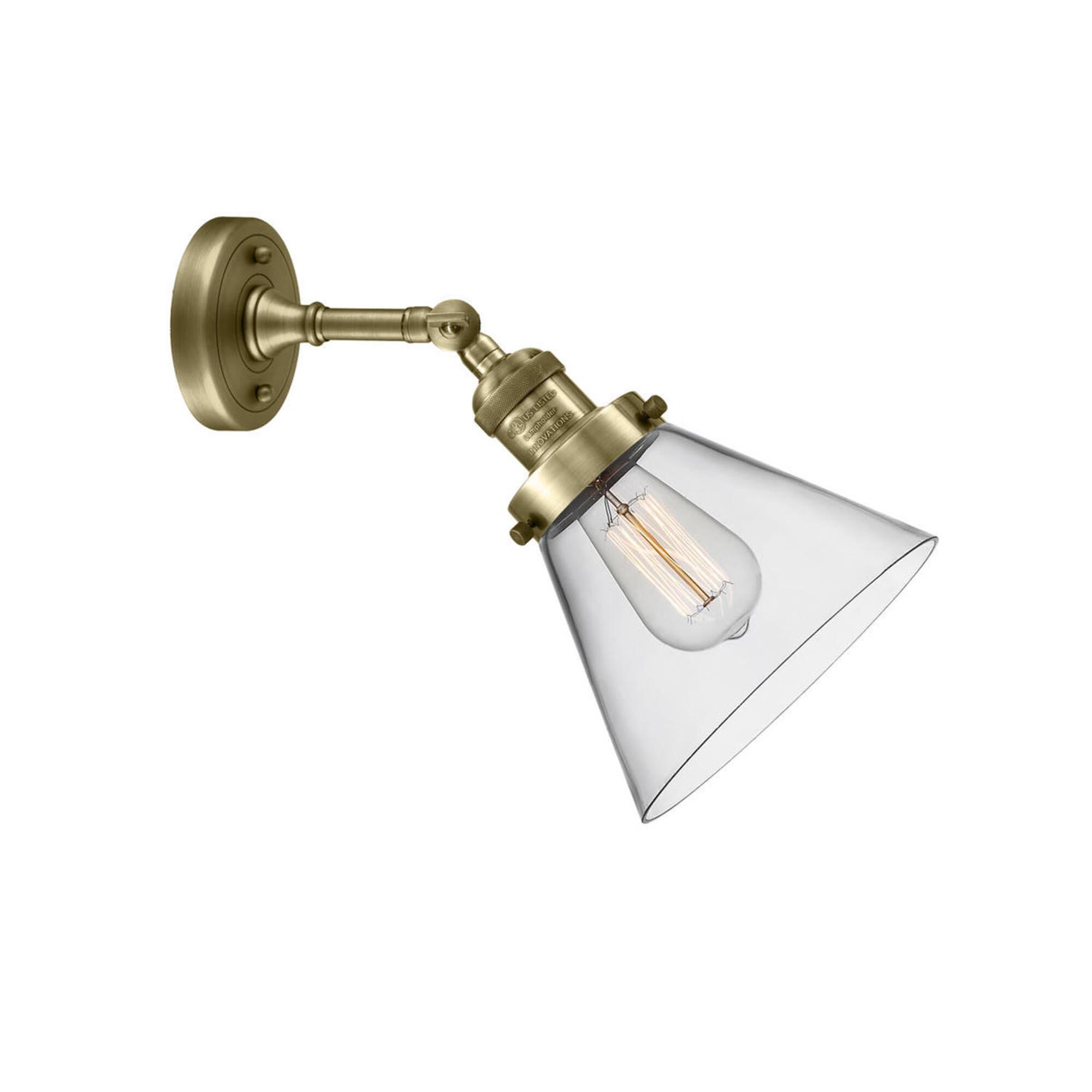 Shown in Antique Brass finish and Clear glass and None accent