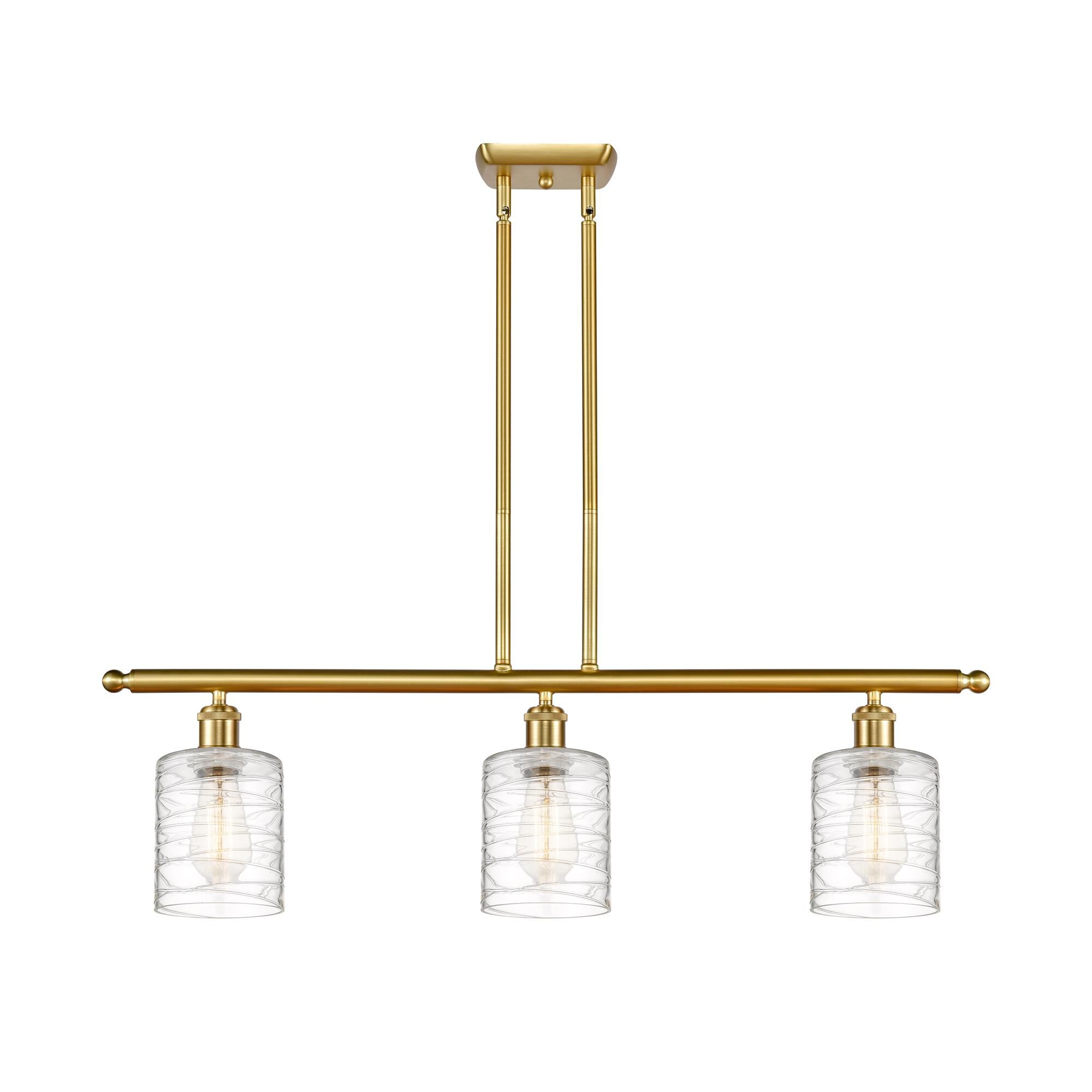 Shown in Satin Gold finish and Deco Swirl Cobbleskill glass