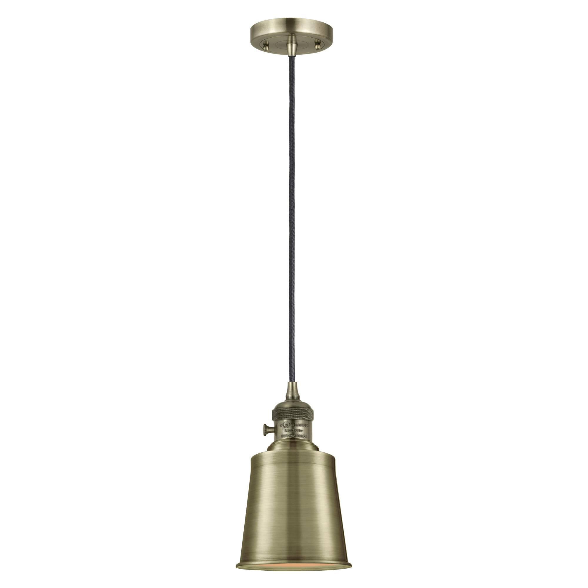Shown in Antique Brass finish and Antique Brass shade