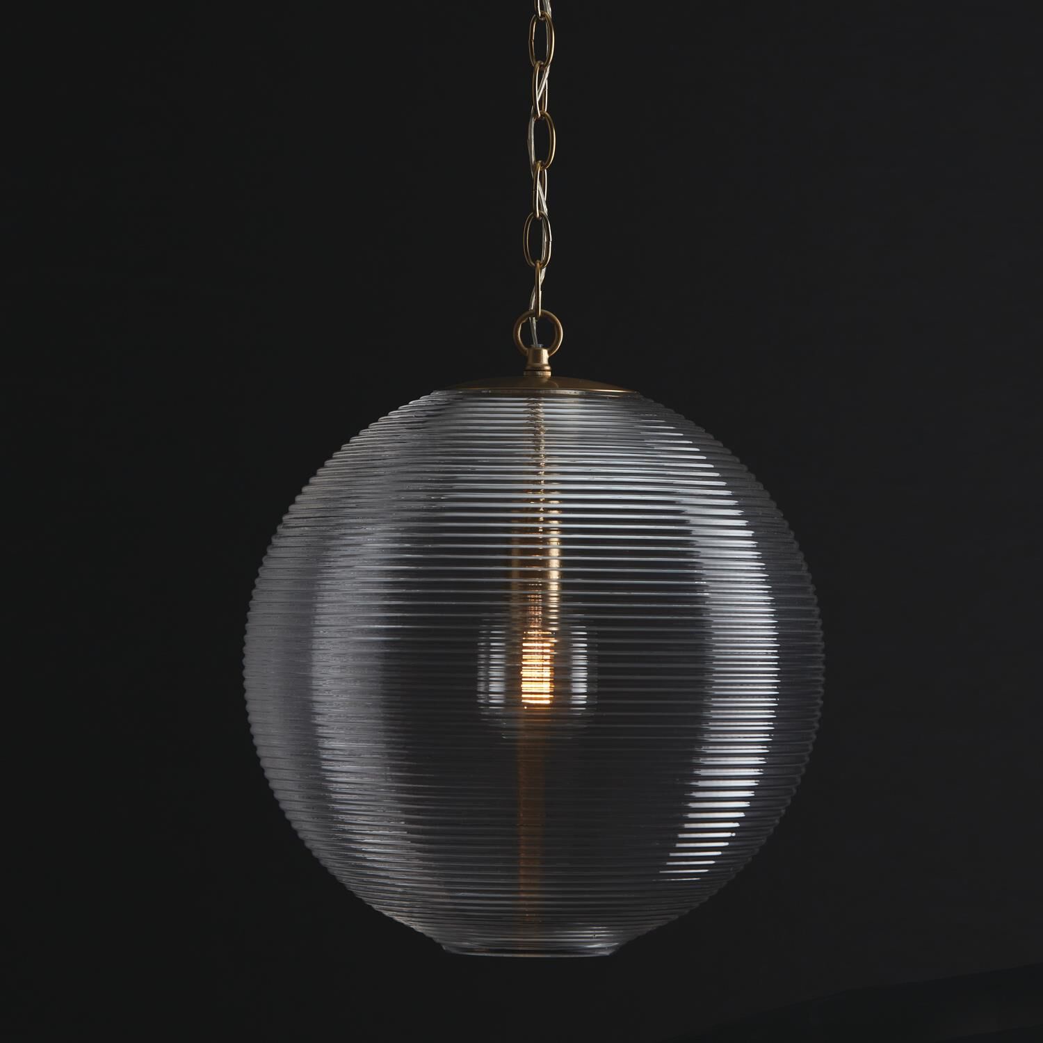 Shown in Matte Brass finish and Clear Ribbed glass