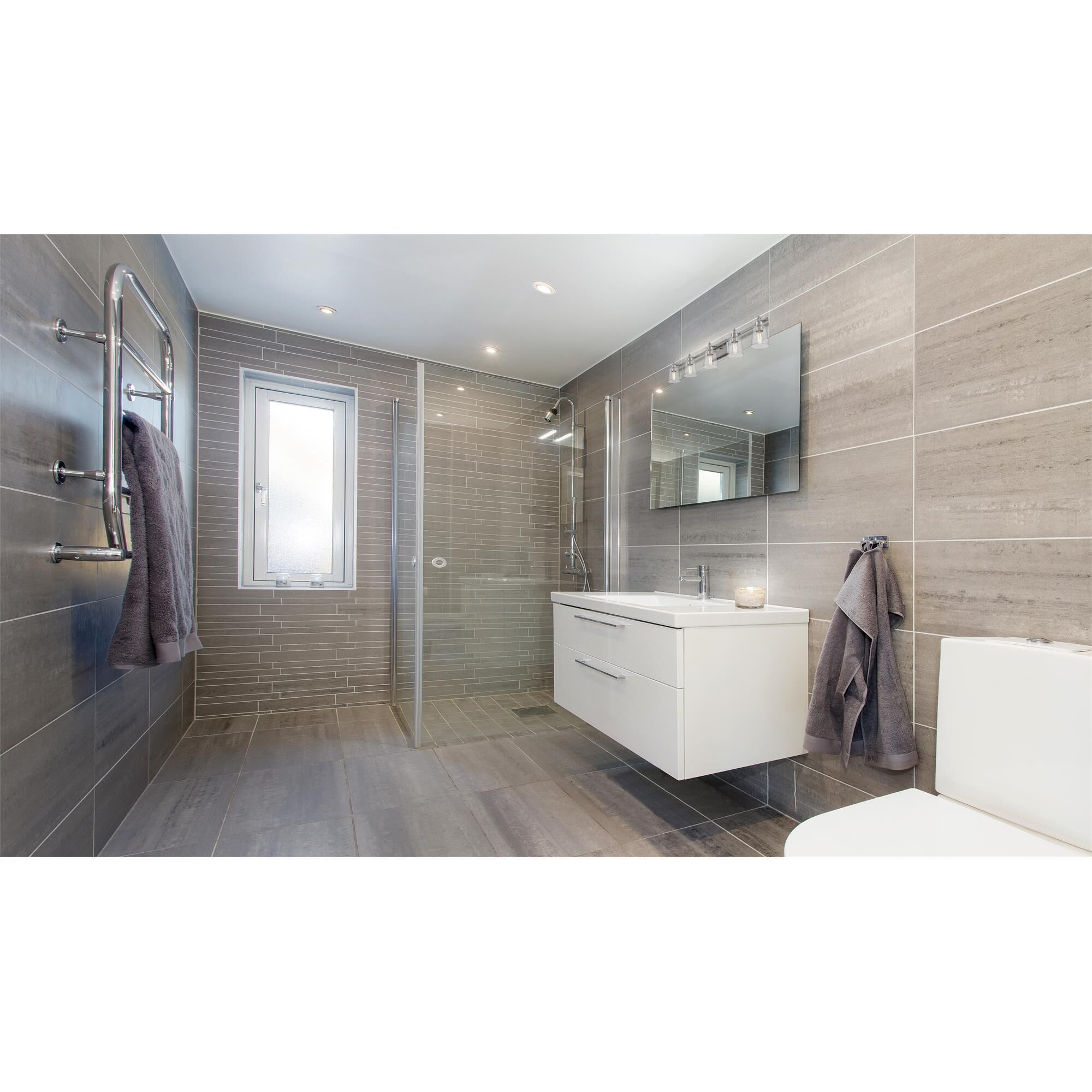 Shown in Brushed Nickel finish and Glass shade