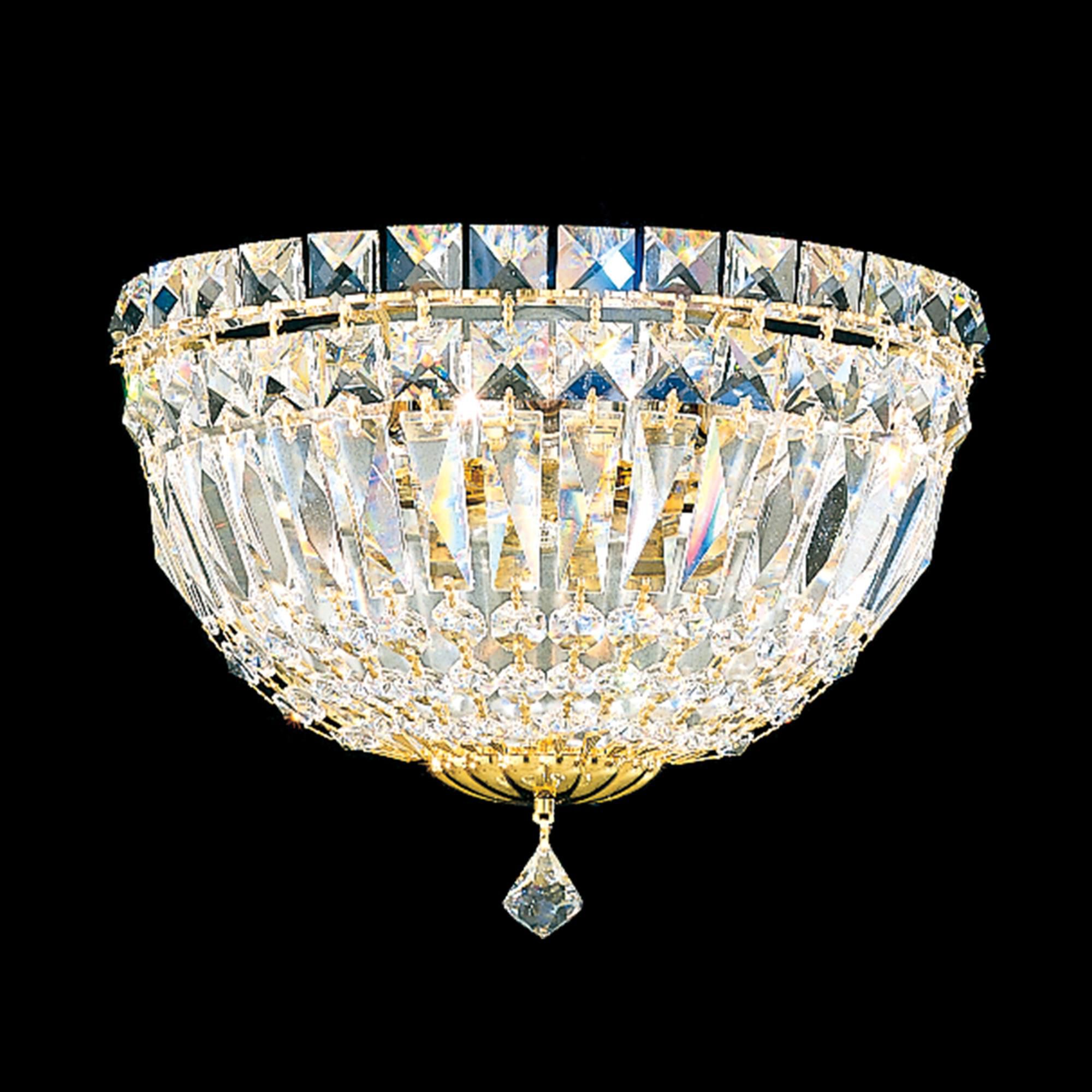 Shown in Polished Gold finish and Clear Radiance crystal