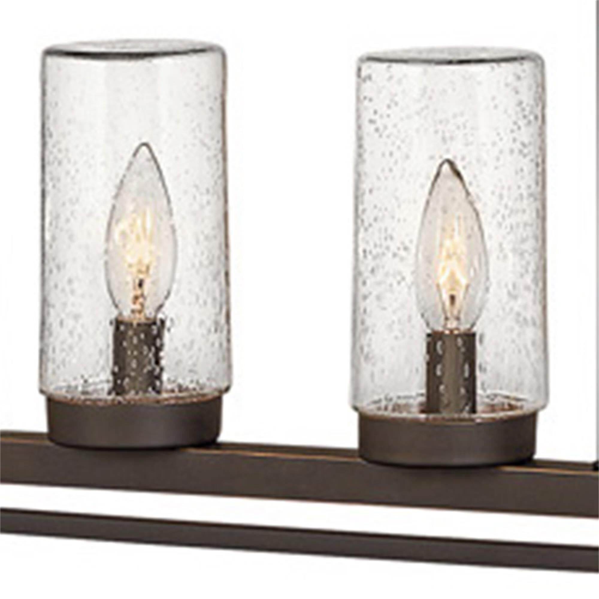 Shown in Oil Rubbed Bronze finish and Clear Seedy glass