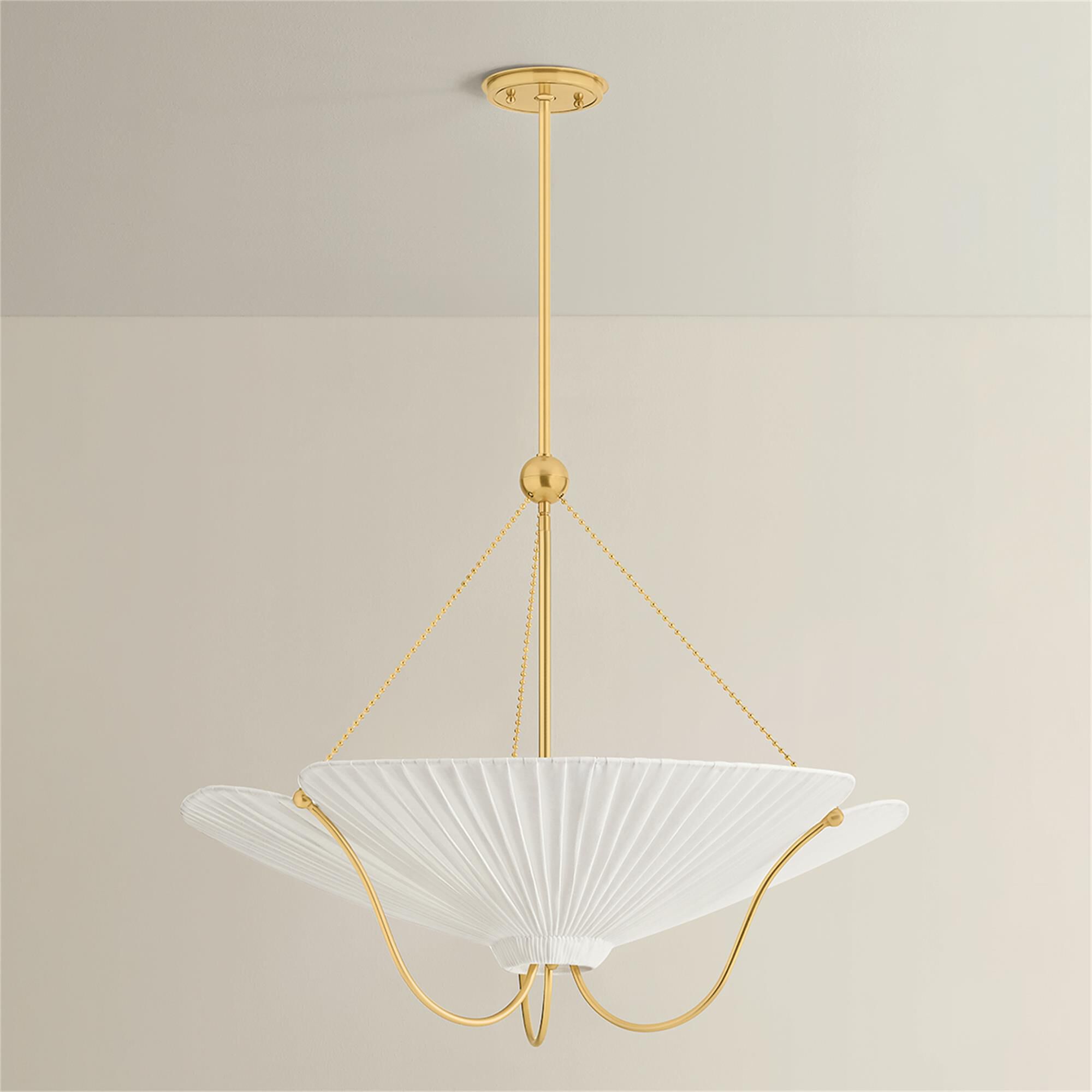 Shown in Aged Brass finish and Ivory Linen shade