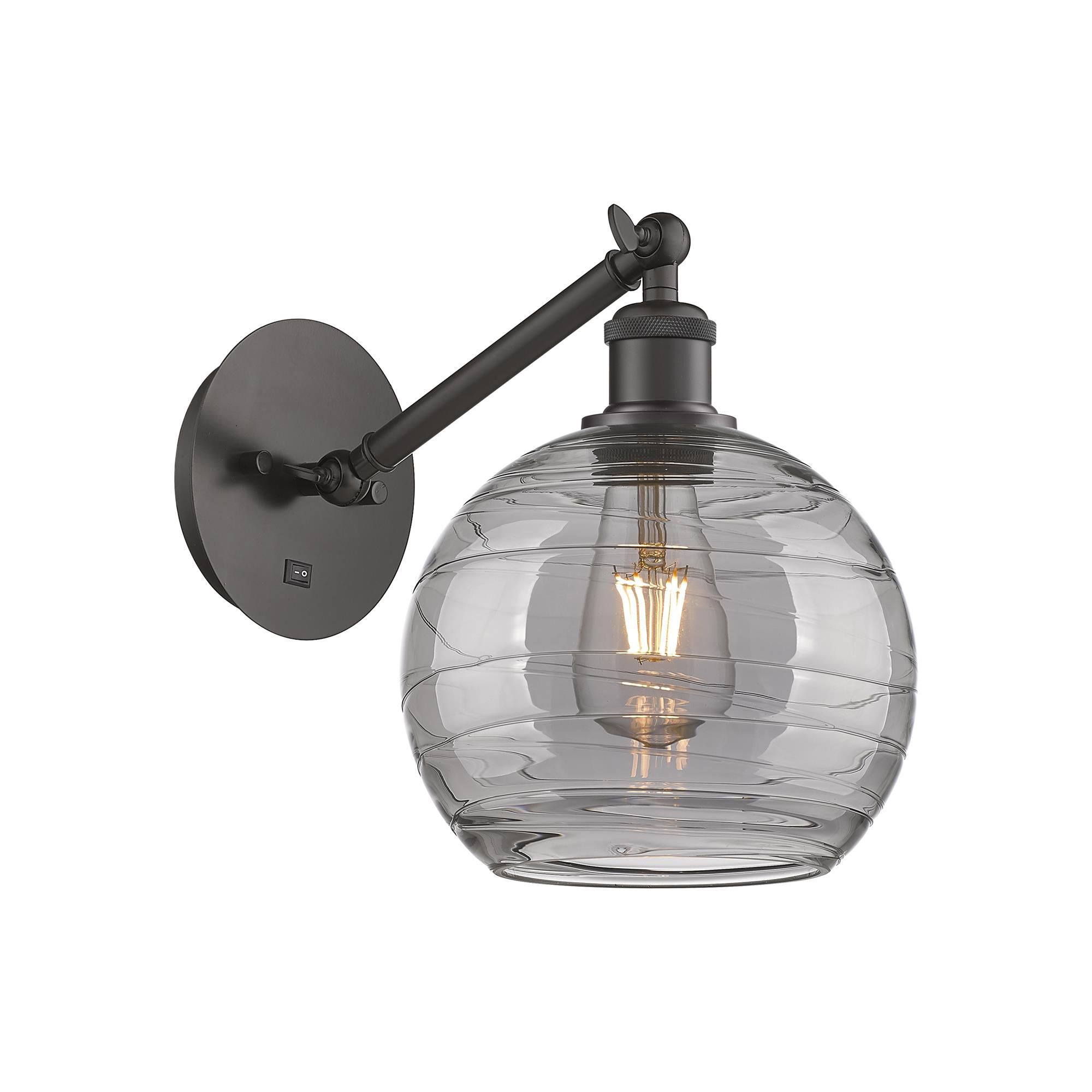 Shown in Oil Rubbed Bronze finish and Light Smoke Deco Swirl glass