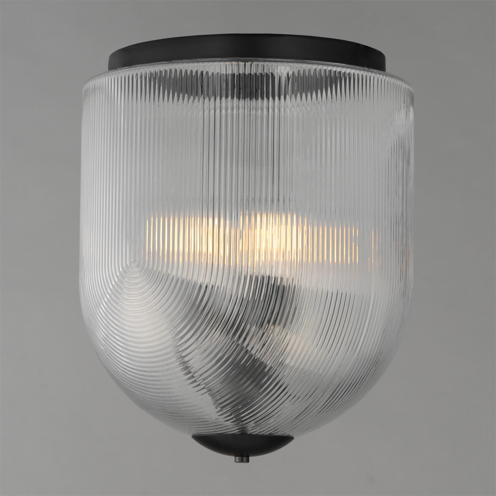 Shown in Black finish and Clear Ribbed glass