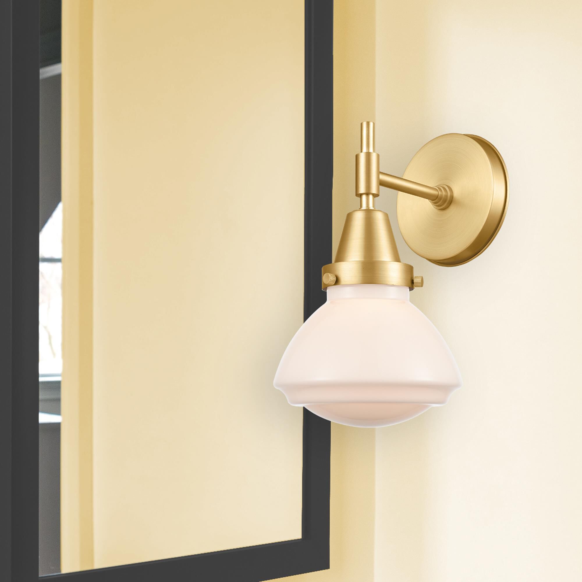 Shown in Satin Gold finish and Matte White Olean glass