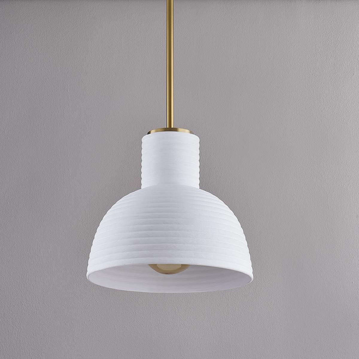 Shown in Aged Brass finish and Ceramic glass