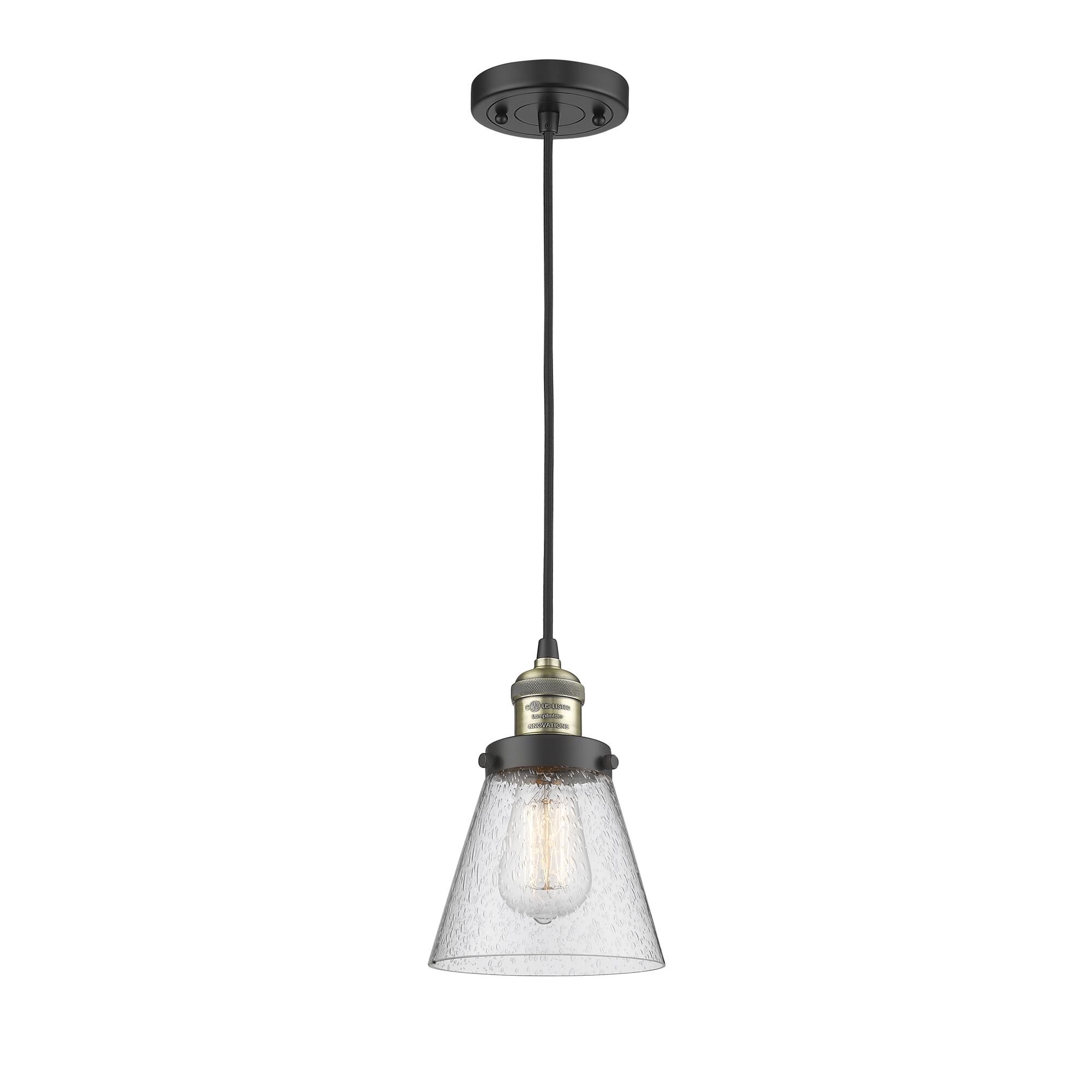 Shown in Black Antique Brass finish and Seedy glass