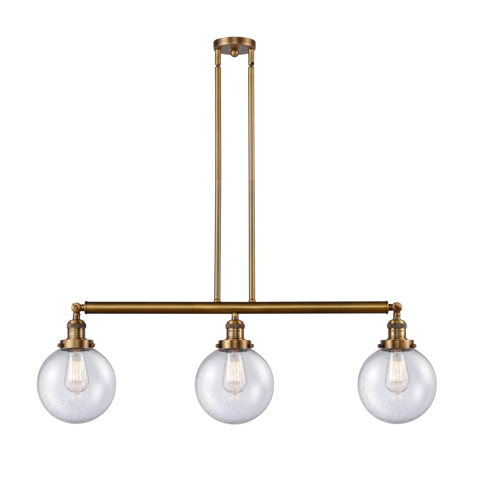 Shown in Brushed Brass finish and Seedy Beacon glass