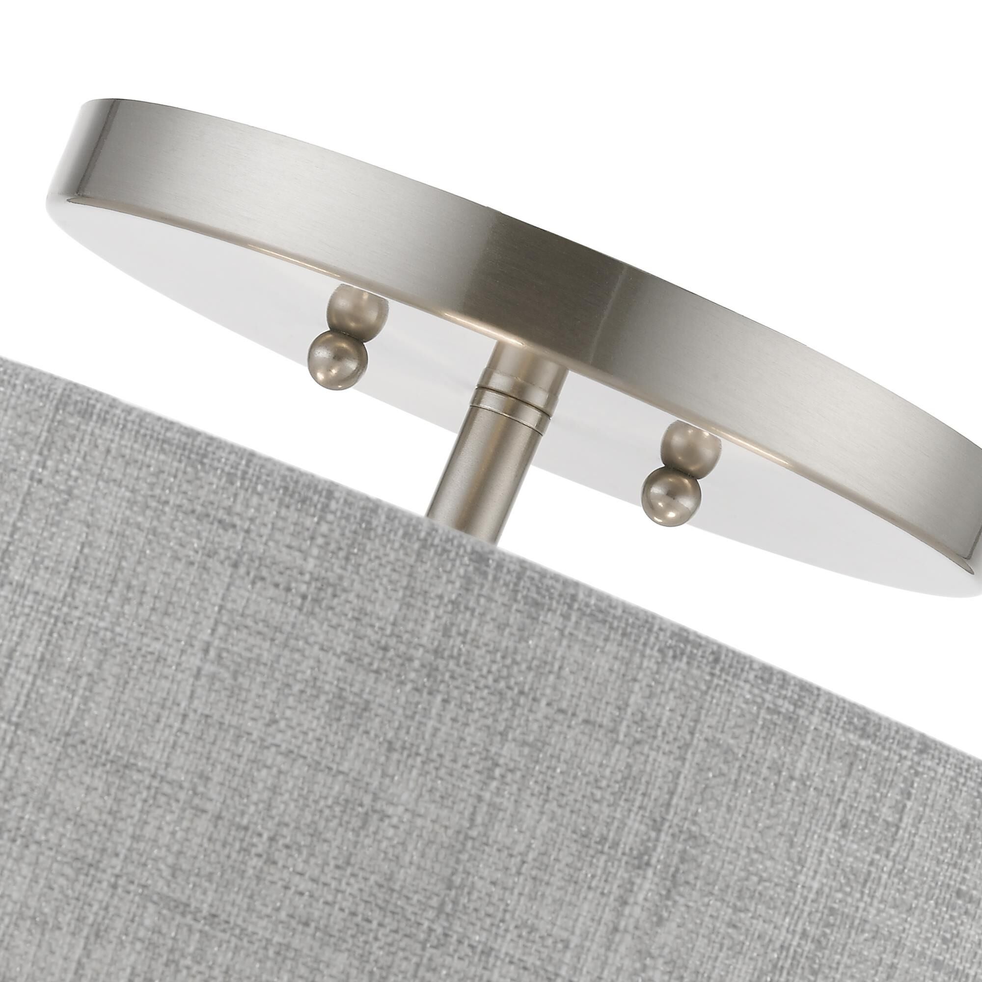 Shown in Brushed Nickel with Shiny White Accents finish and Hand Crafted Urban Gray Hardback Fabric With White Inside shade