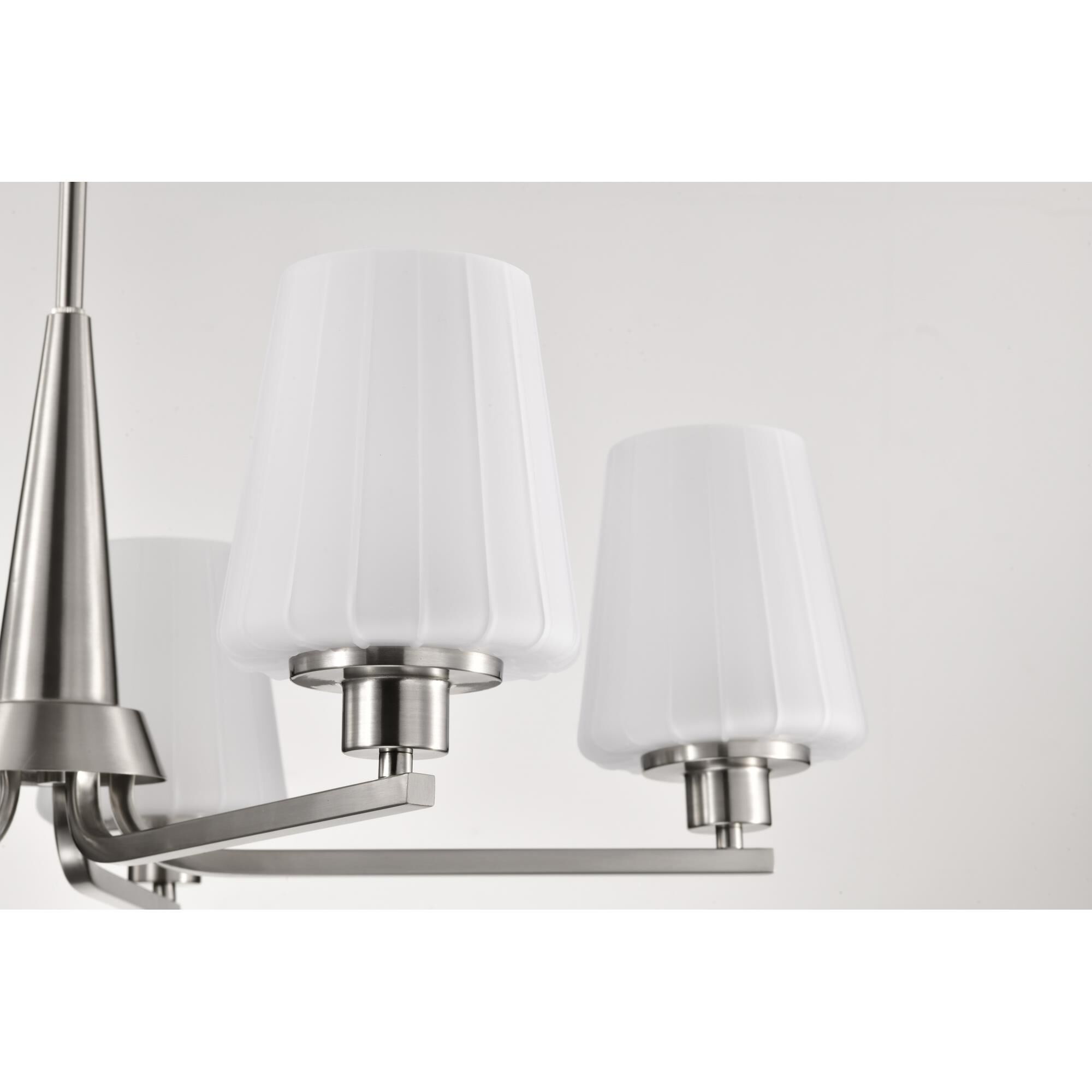 Shown in Brushed Nickel finish and Etched White glass
